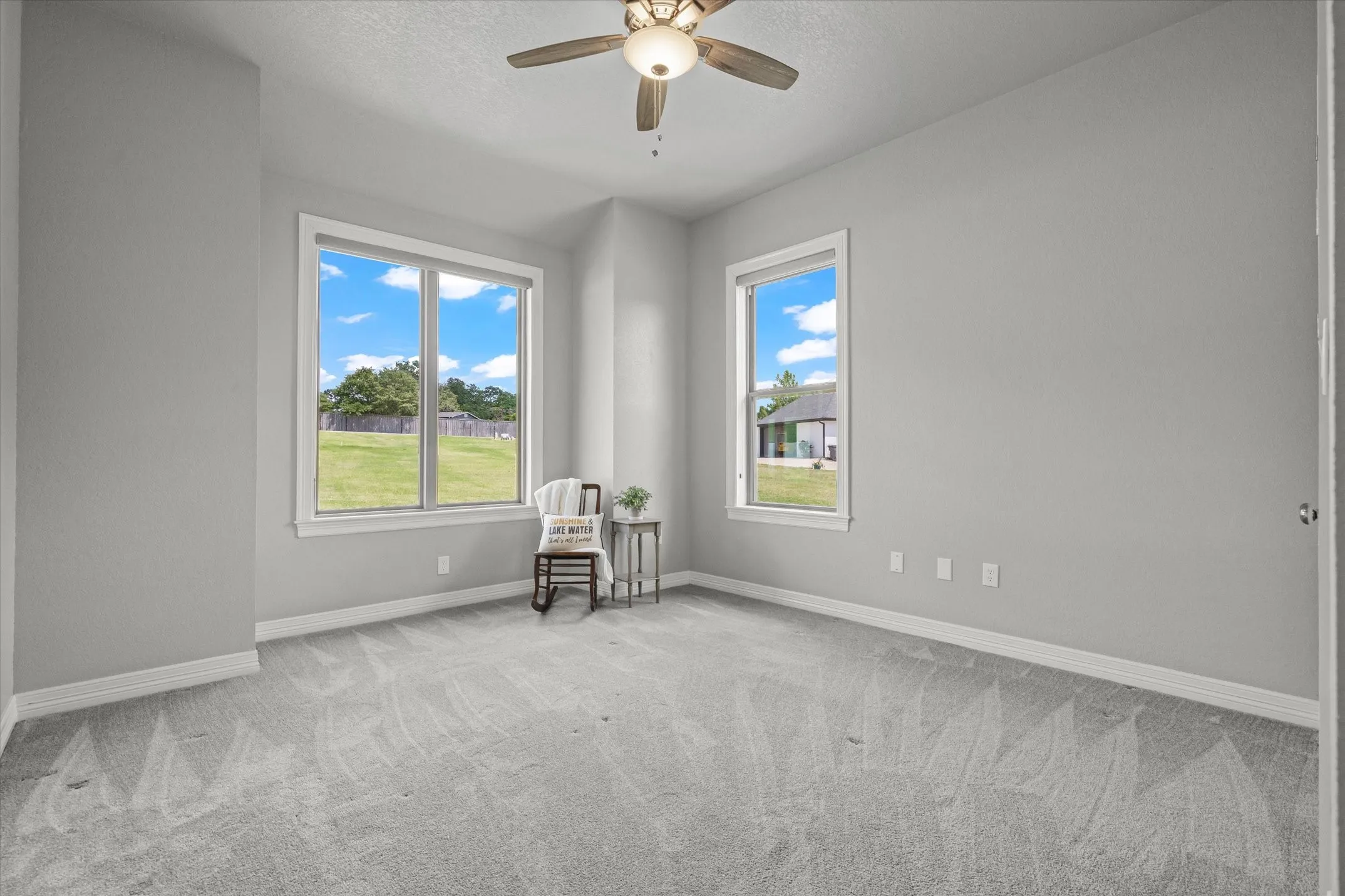 Bedroom 4 is largest guest room with walk in closet and views of the large front yard
