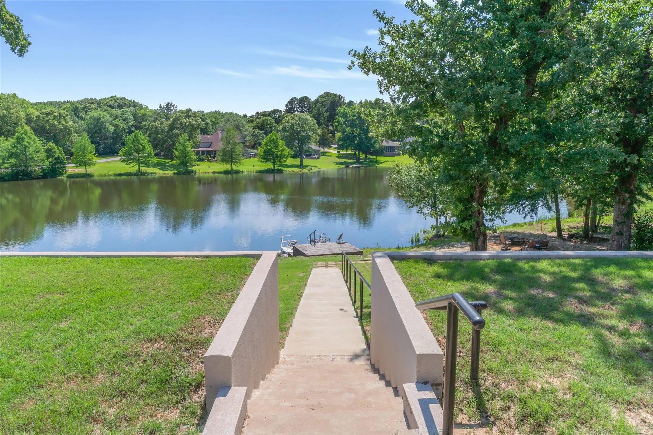 Leads to the pier on the lake and fire pit area