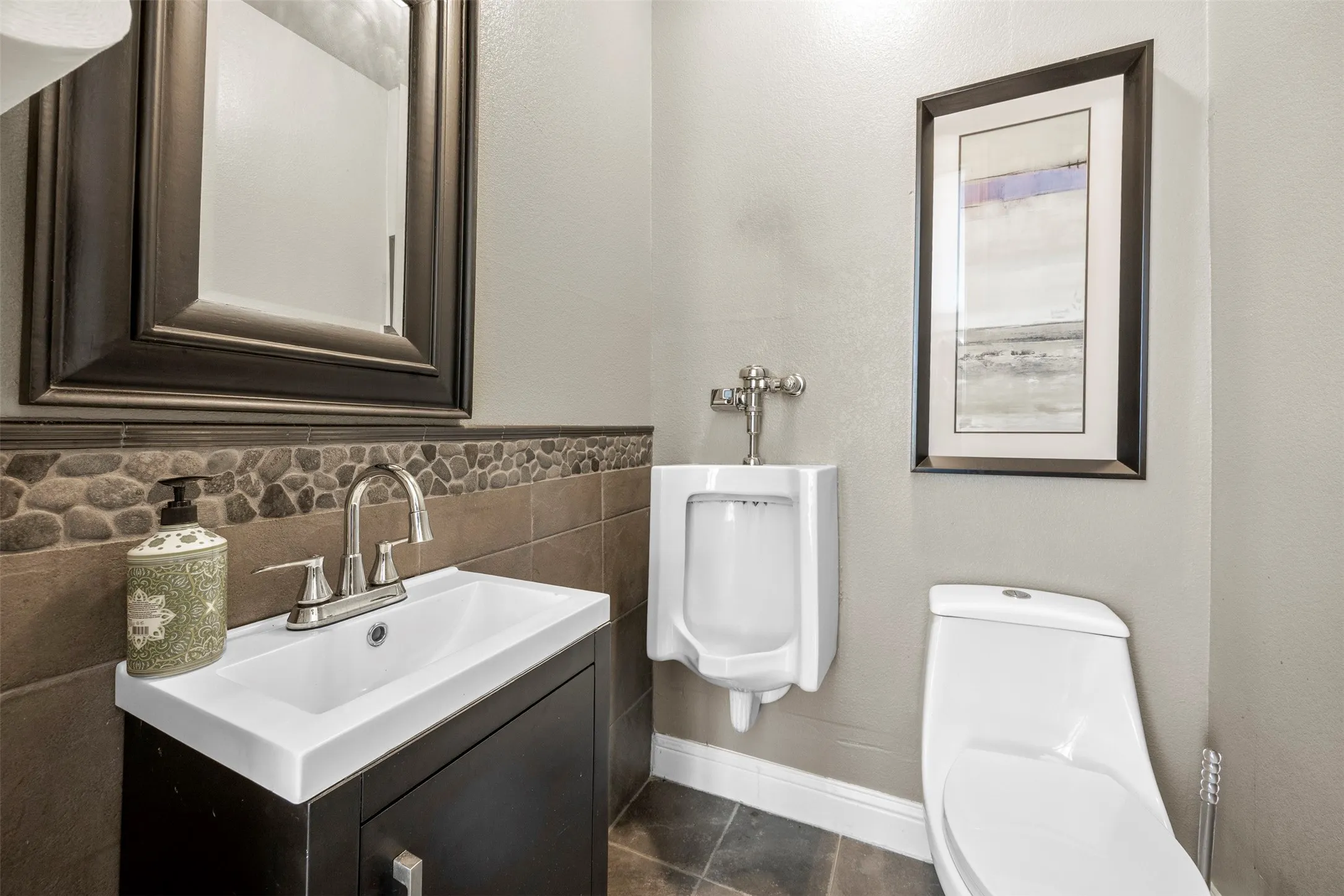 Half bath in the flex space/man cave.