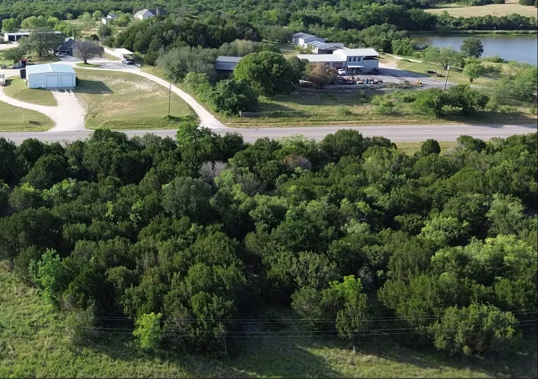 Expansive wooded acreage featuring mature trees, offering privacy and natural surroundings: Lot# 101-102