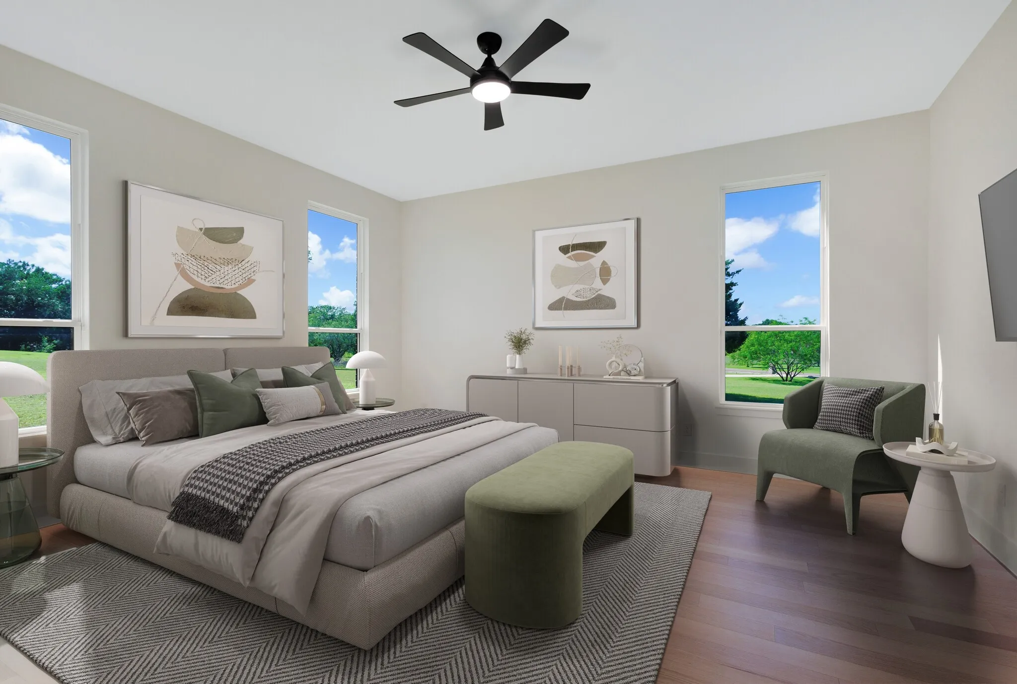 Spacious room with wood-finish flooring and light-toned walls