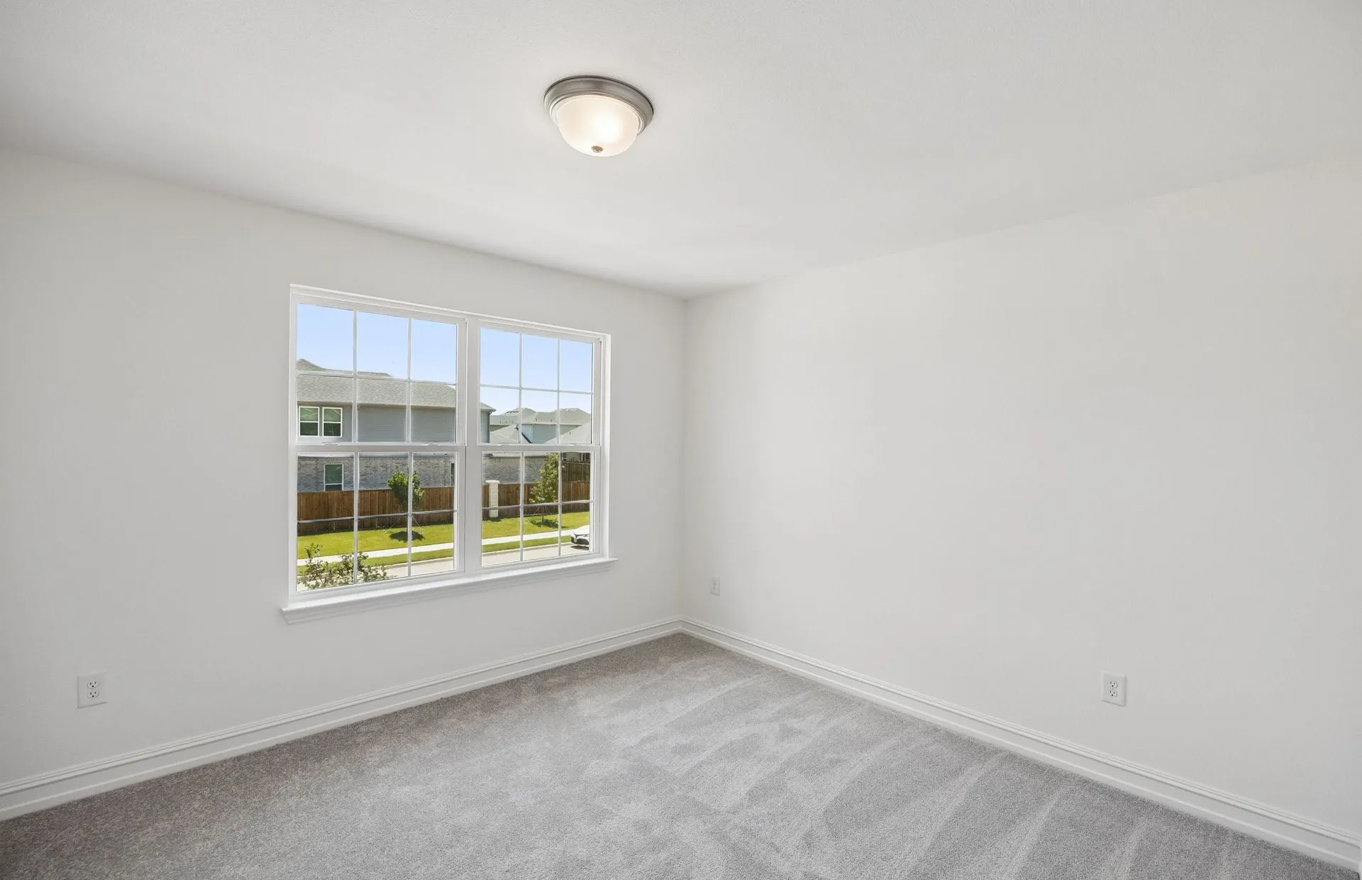 Secondary bedroom with large window