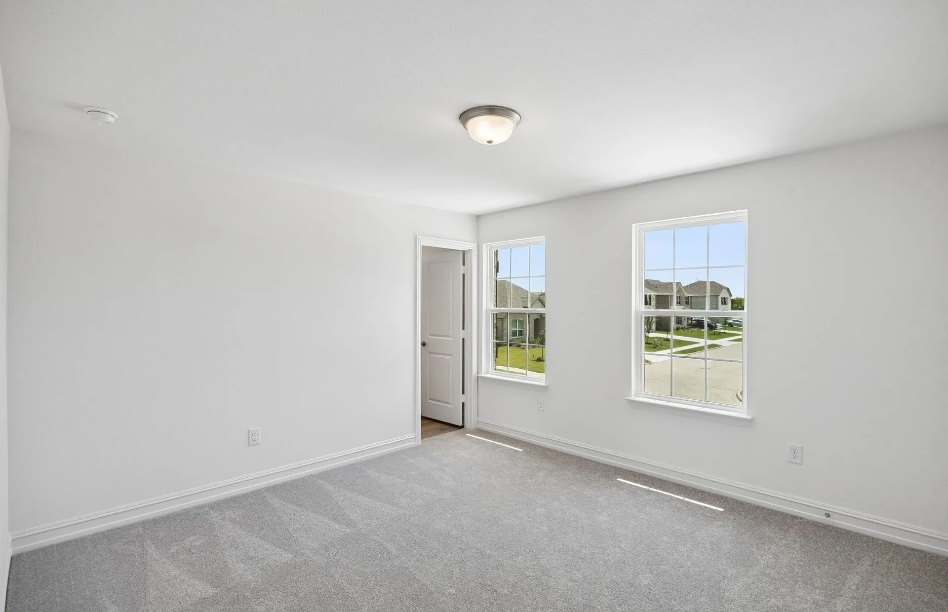 Secondary bedroom with large windows