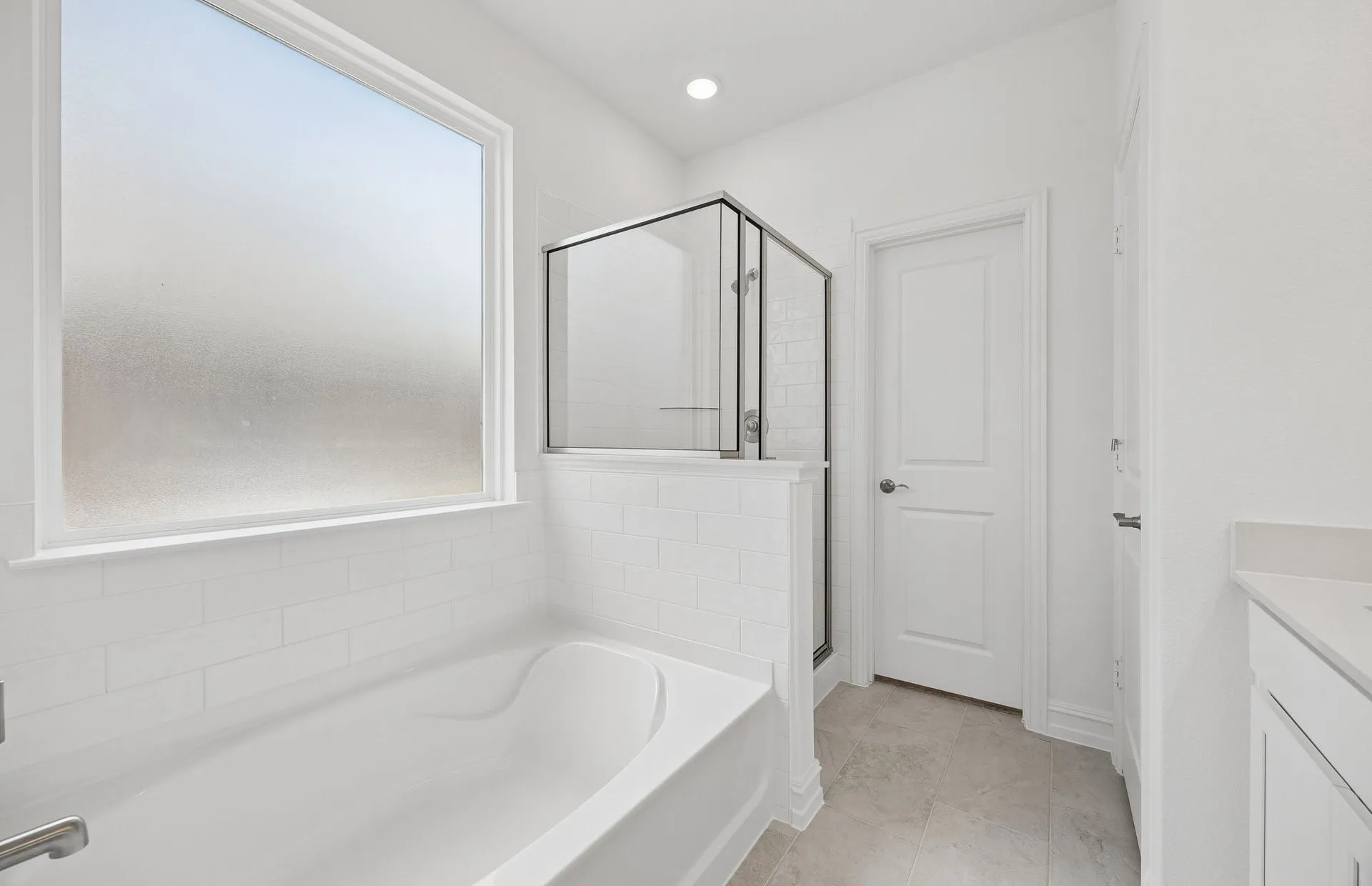 Primary bath with separate tub and shower