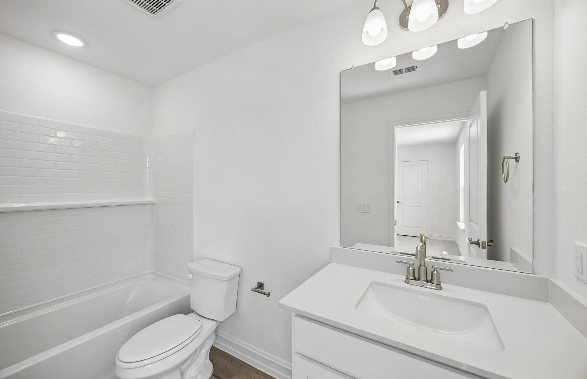 Secondary bath with tile surrounded shower