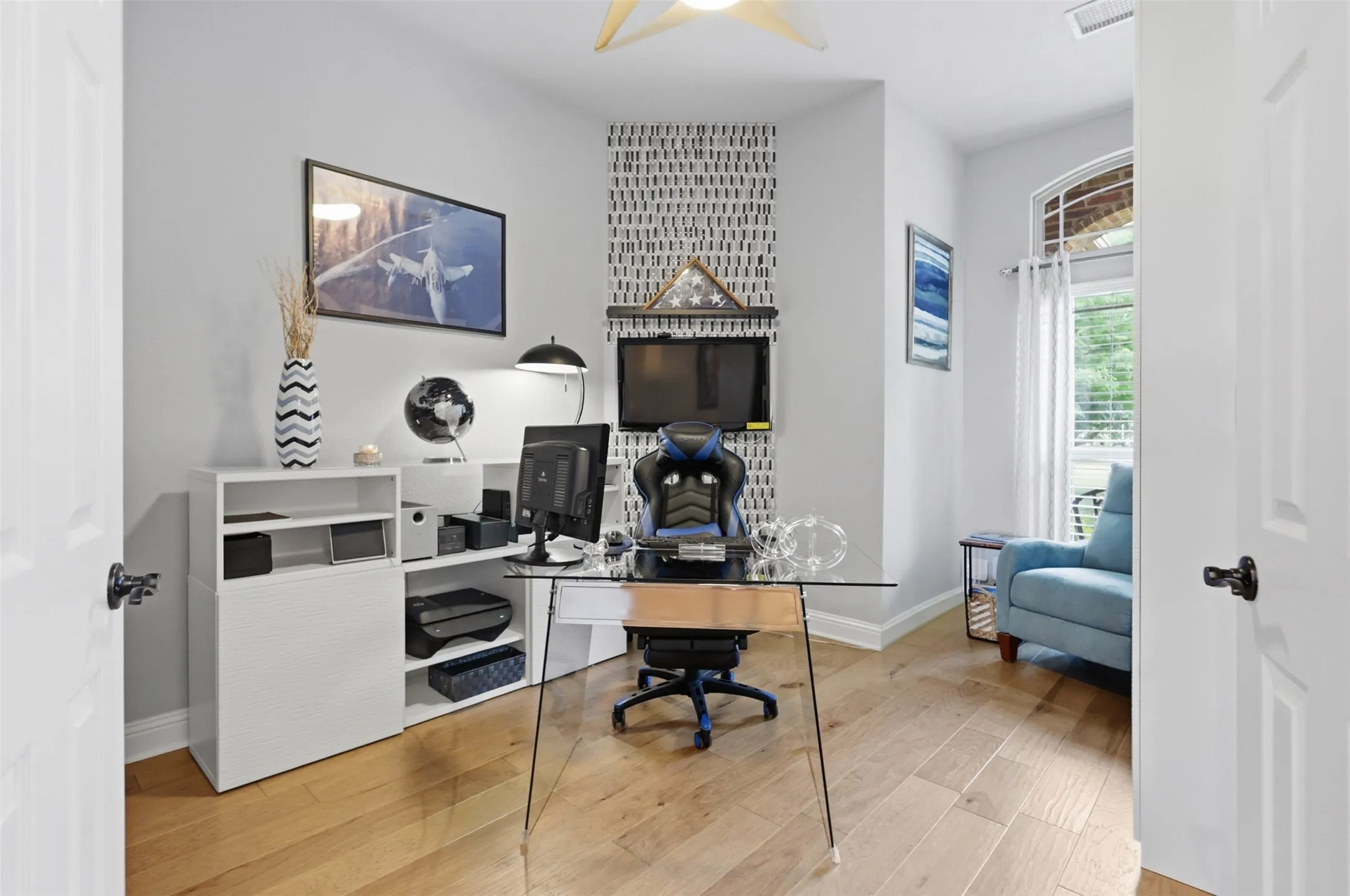 Dedicated office space with wood-finish flooring