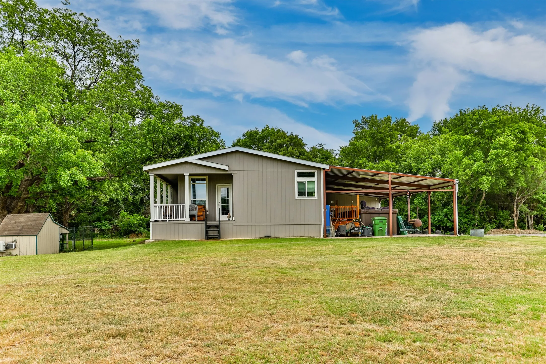 Side view of home and carport