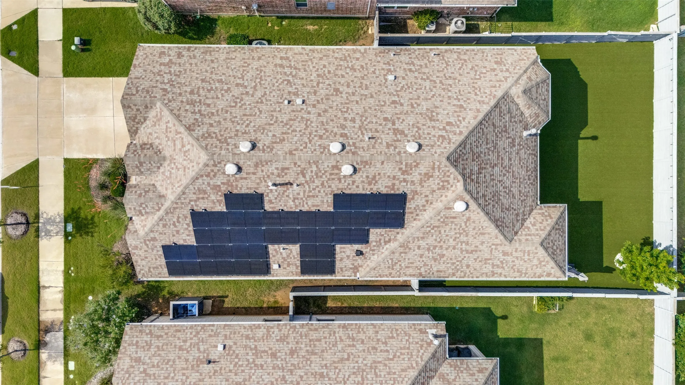 Roofline featuring multiple solar panels
