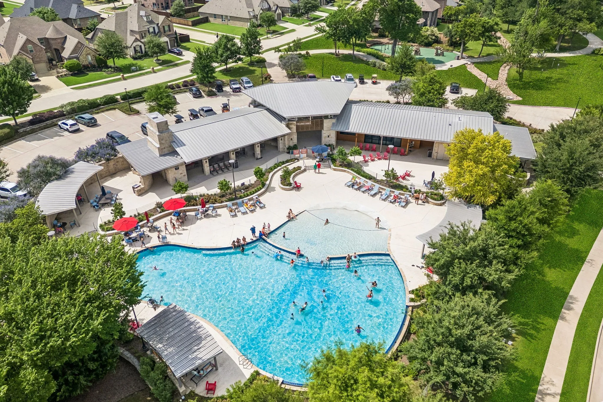 Resort-style pool with integrated beach entry - perfect for the upcoming Texas summer