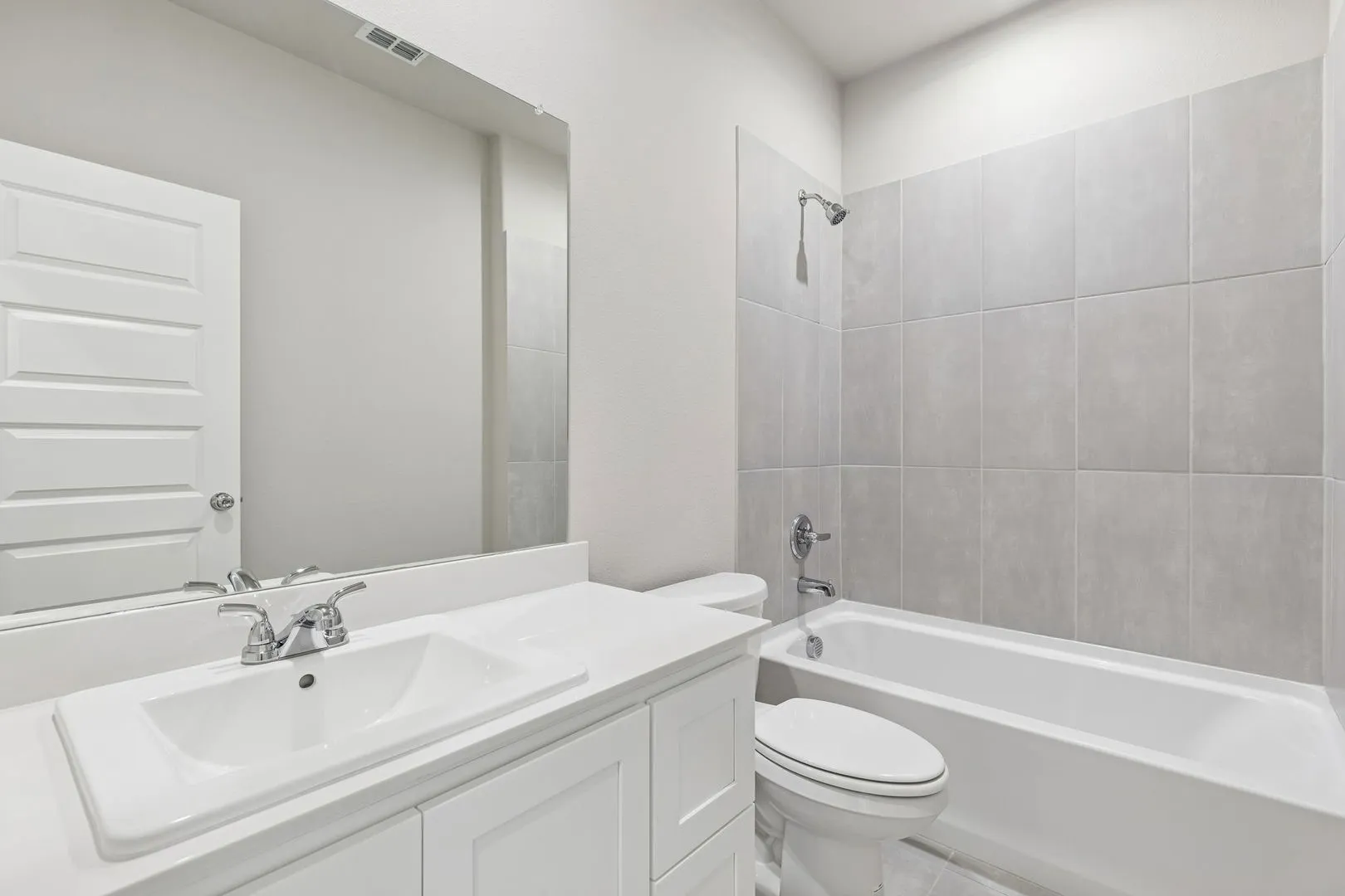 Bathroom in the Holden home plan by Trophy Signature Homes – REPRESENTATIVE PHOTO