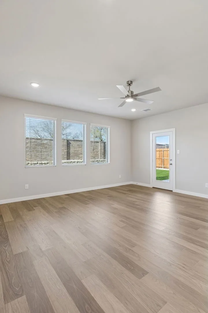 Living Room in the Holden home plan by Trophy Signature Homes – REPRESENTATIVE PHOTO