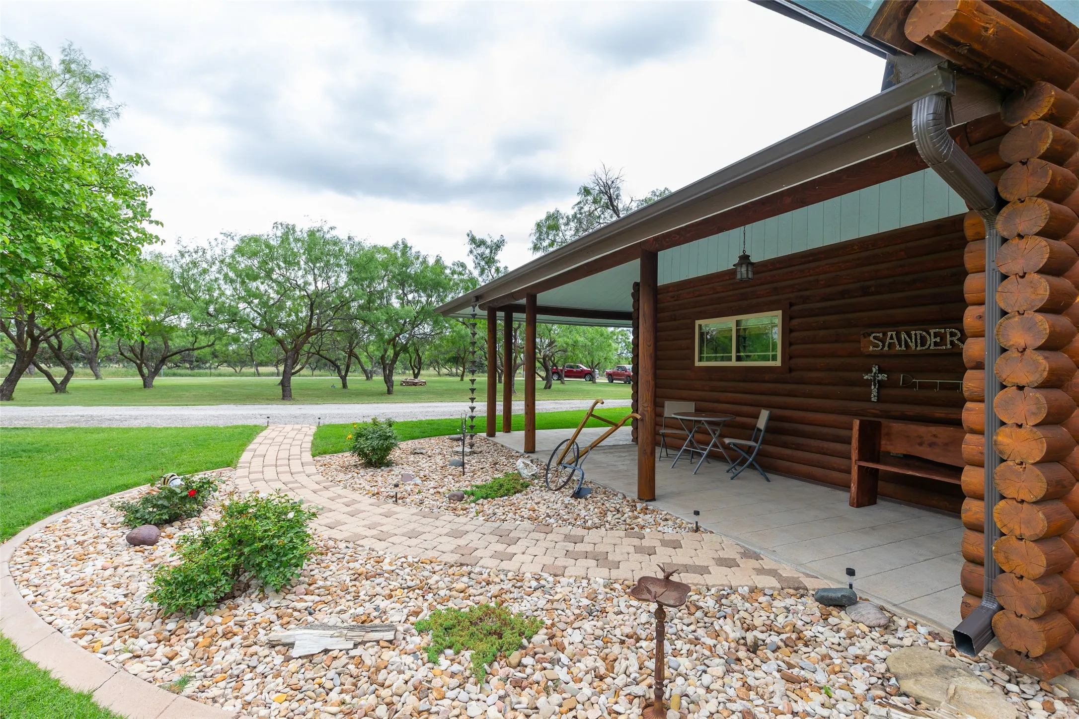 Front entrance is peacefully and thoughtfully
landscaped