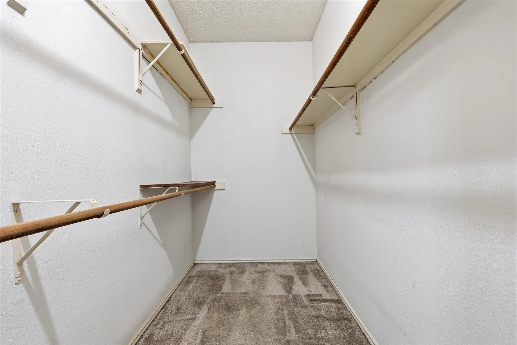 Walk-in closet at Primary Bedroom