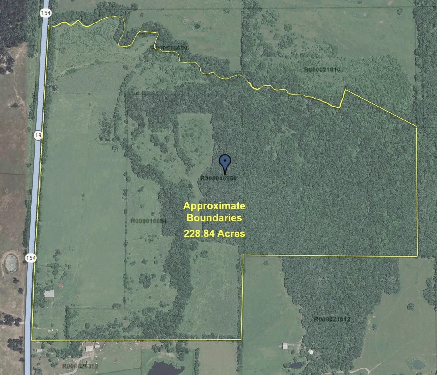Yellow line is approximate boundary for 228.84 acres.