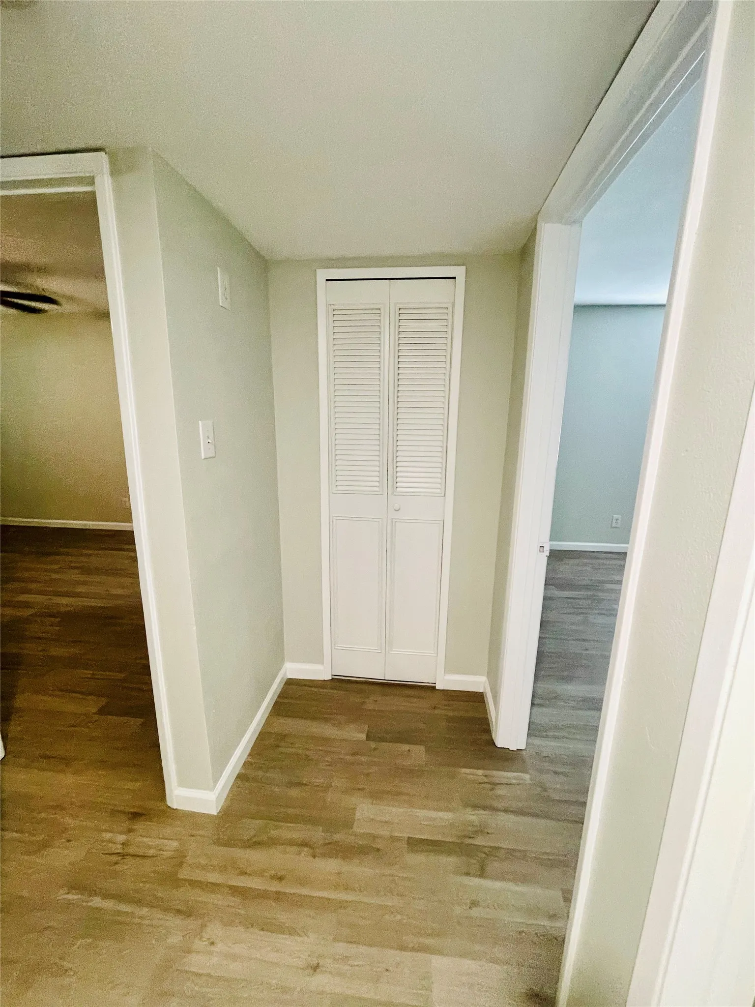 Hall with light wood-type flooring