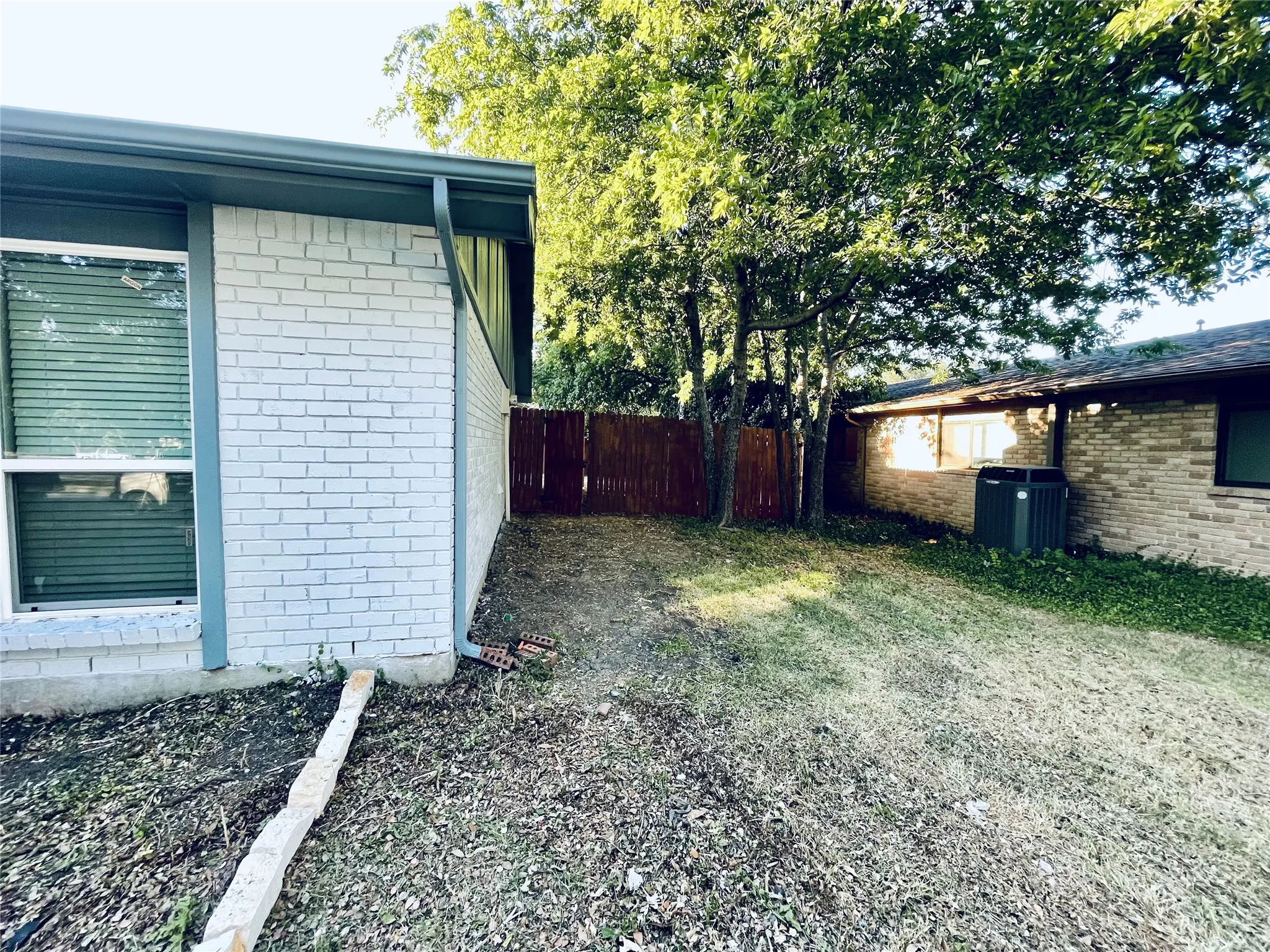 View of yard featuring cooling unit