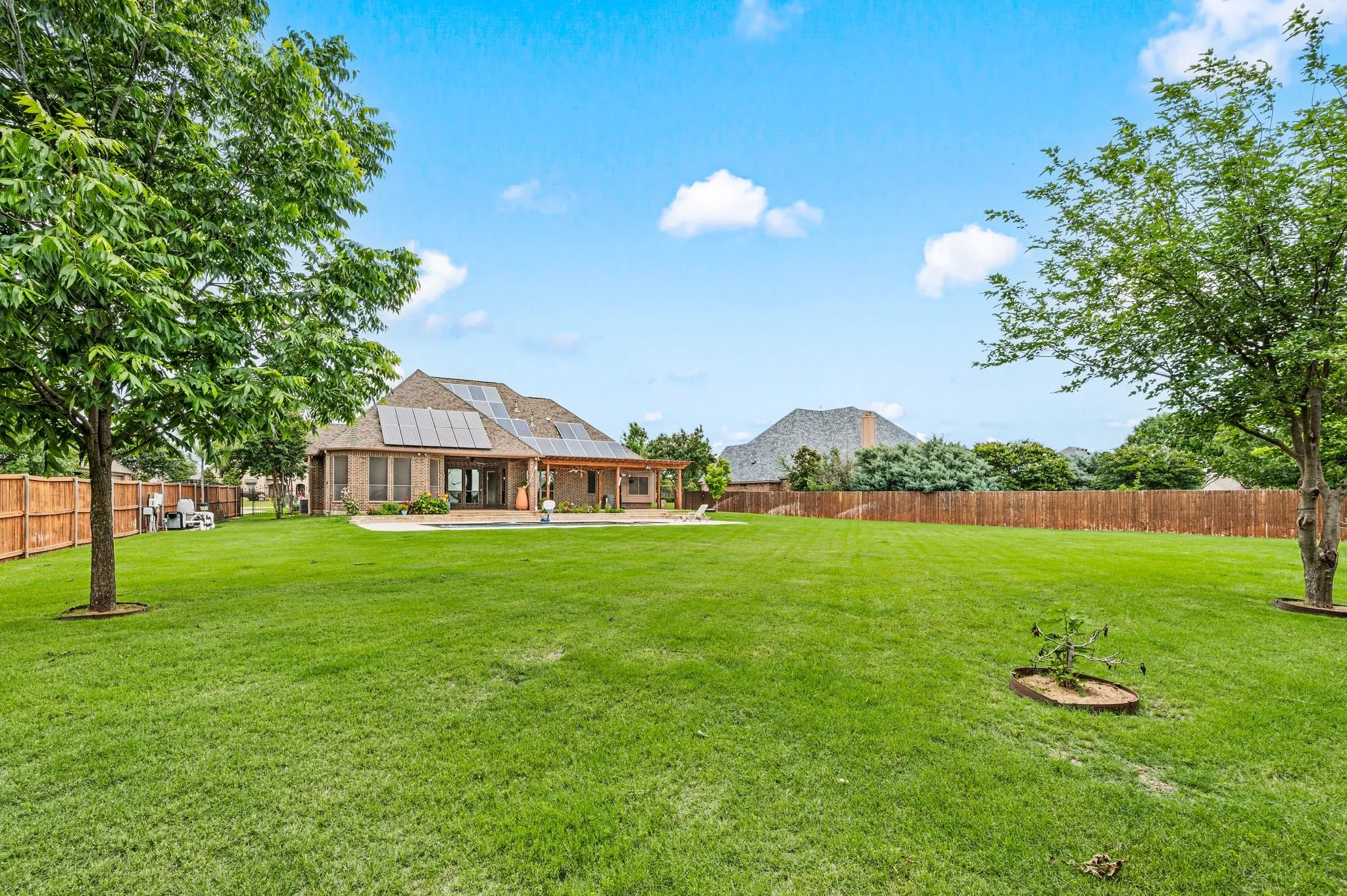This home is solar powered--owned, not leased for low low energy bills. A propane gas tank is buried in the backyard for fuel efficient heating. The roof was replaced in 2019. The home has an aerobic septic system.