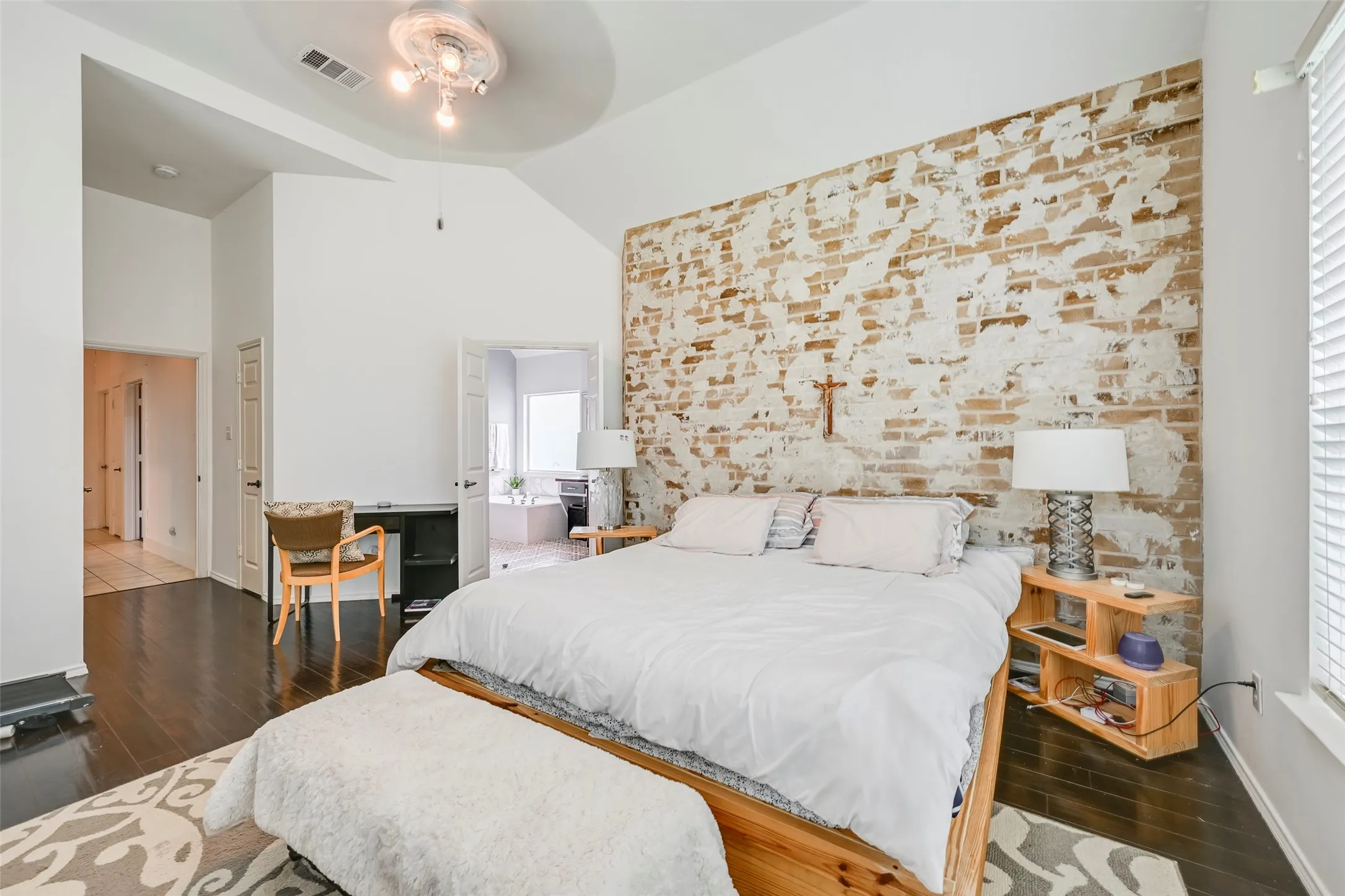 Vaulted ceiling with a contemporary flush-mount light fixture