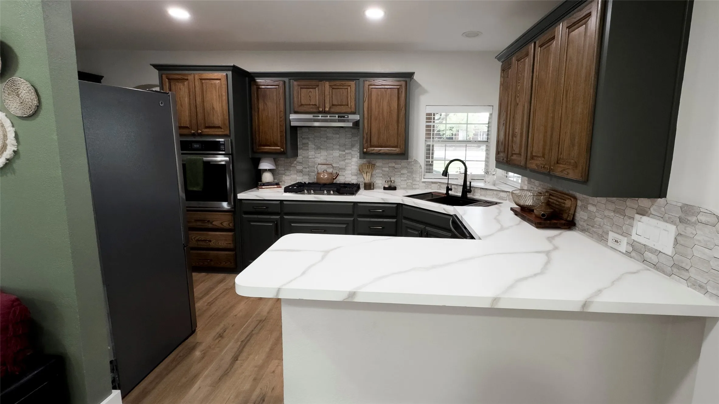 Updated kitchen with plenty of space to cook and extra storage for organization