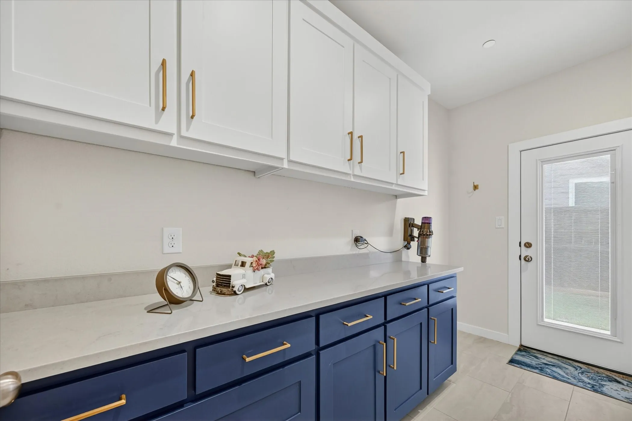 Huge laundry room with backyard exit