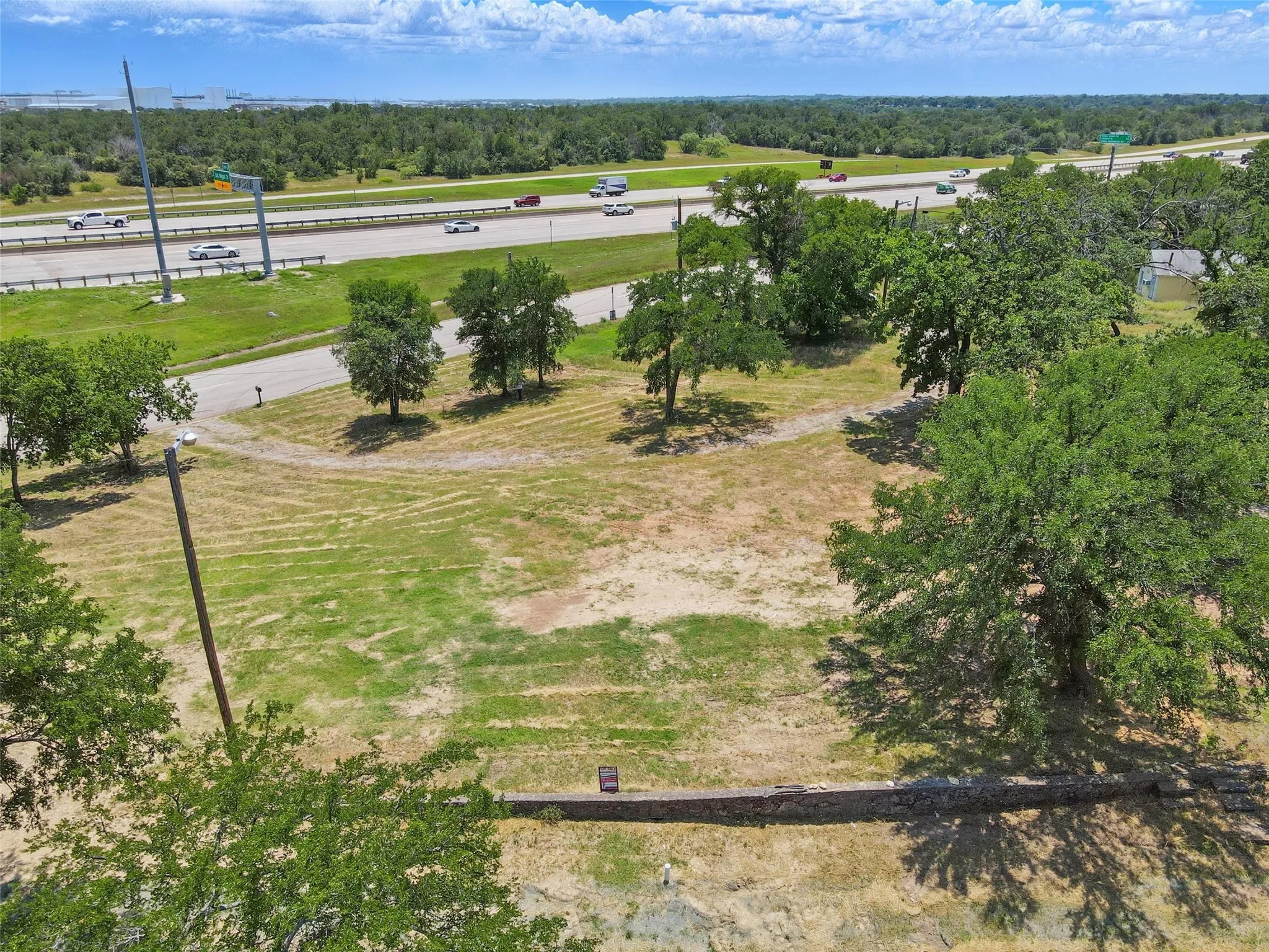 Drone / aerial view of a tree filled landscape