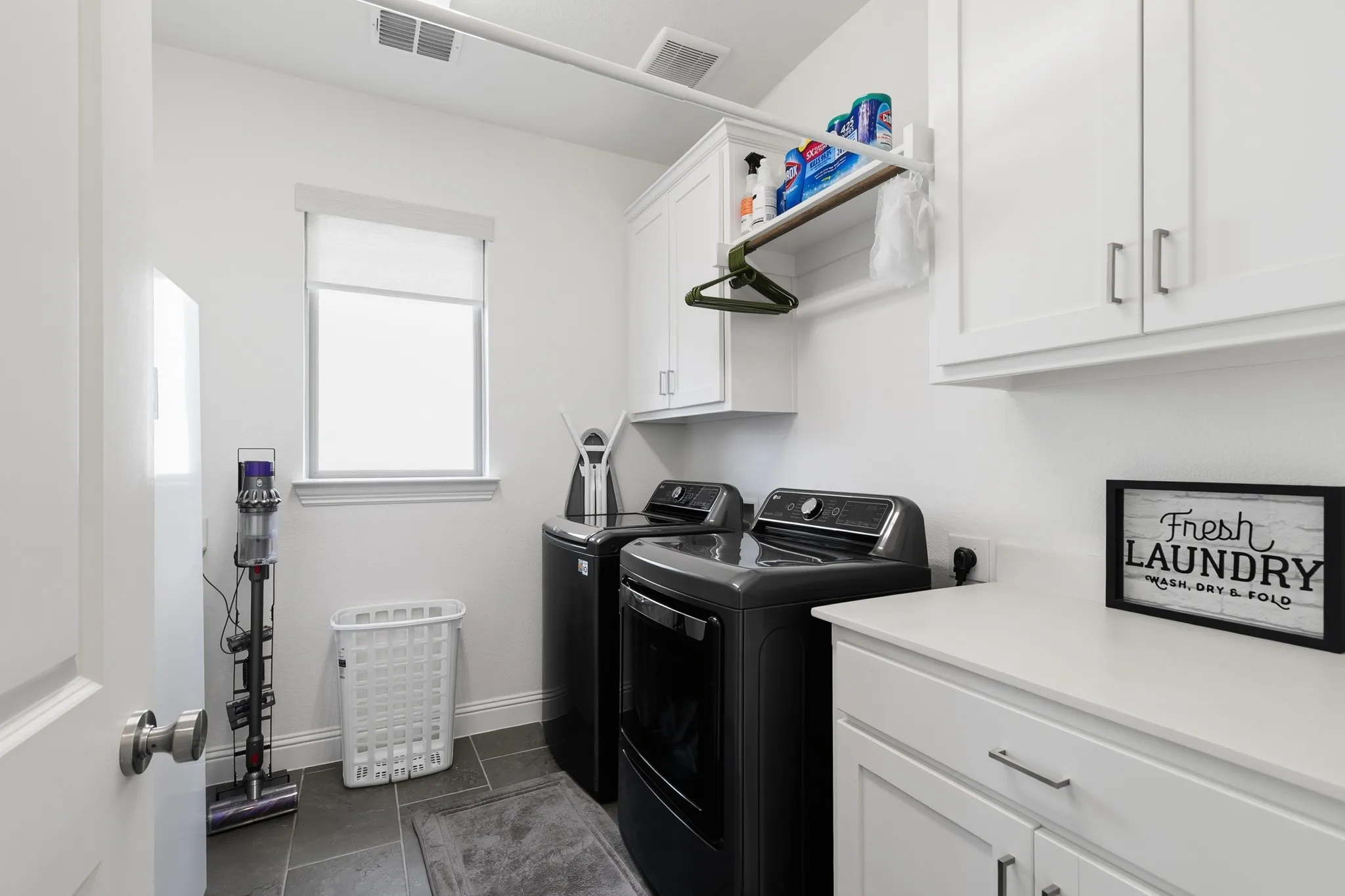 Generously sized laundry room with room for freezer