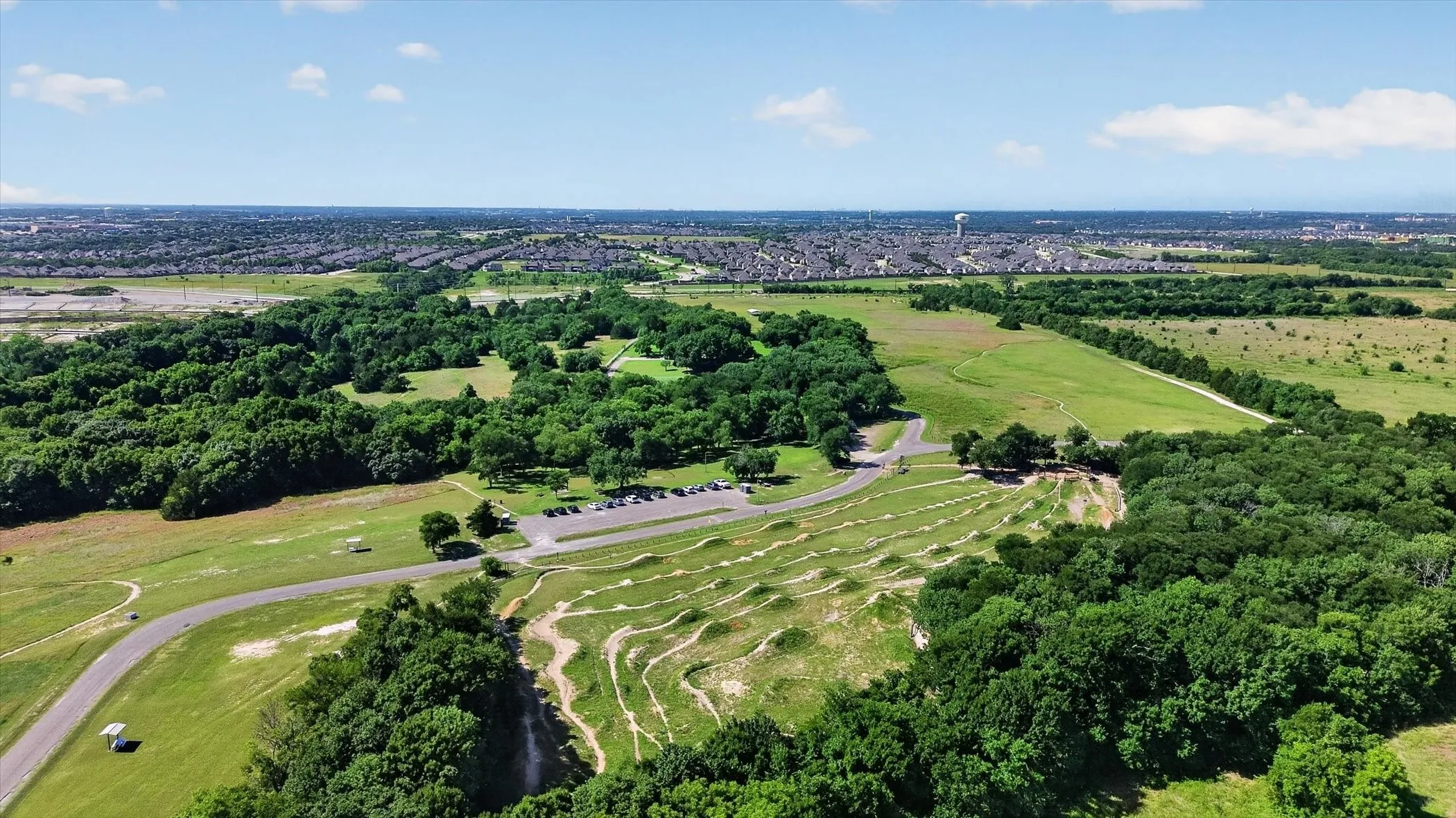 Just minutes from the 212-acre Erwin Park — a local favorite for hiking, biking, and family picnics.