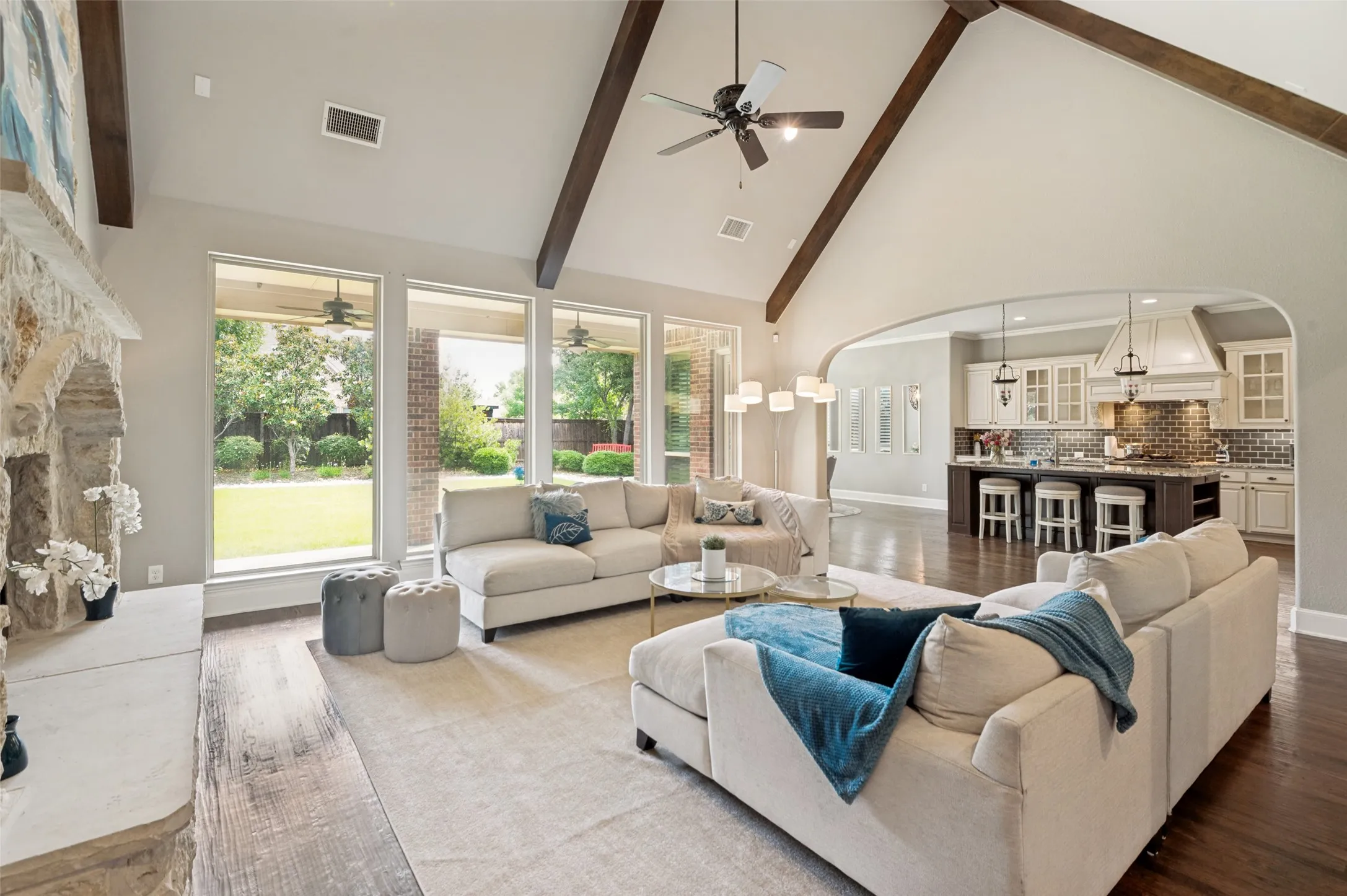 Designed for both effortless entertaining and everyday luxury, this grand open-concept floor plan seamlessly blends the kitchen, living, and dining spaces into one expansive gathering area, ideal for hosting guests or enjoying relaxed family living in style.
