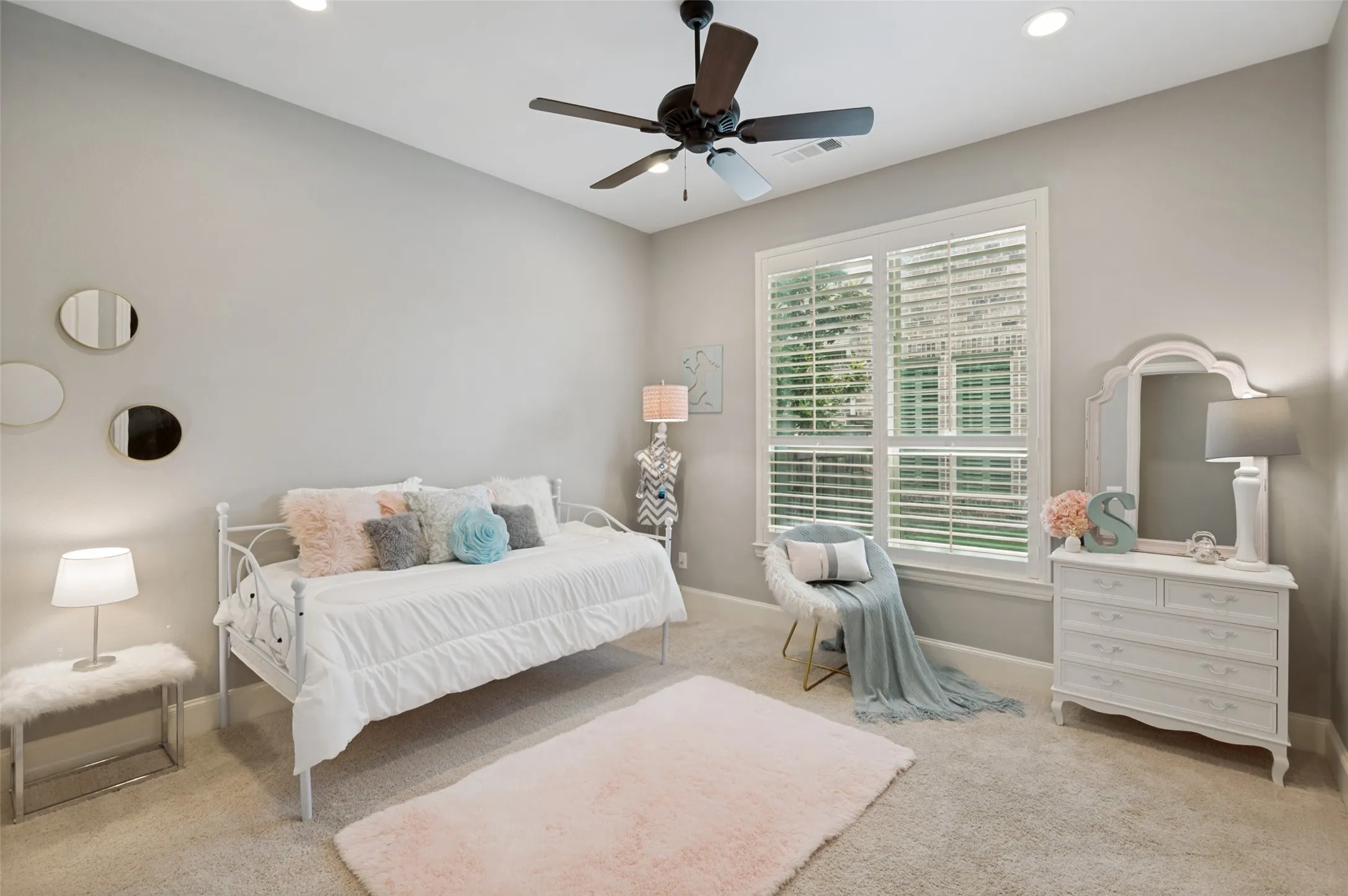 This spacious secondary bedroom offers the perfect combination of comfort, privacy, and functionality. Generously sized and filled with natural light, the room provides ample space for a bedroom suite, study area, or cozy sitting nook, featuring its own ensuite bath and a large walk-in closet, providing the convenience and comfort typically reserved for a primary suite.