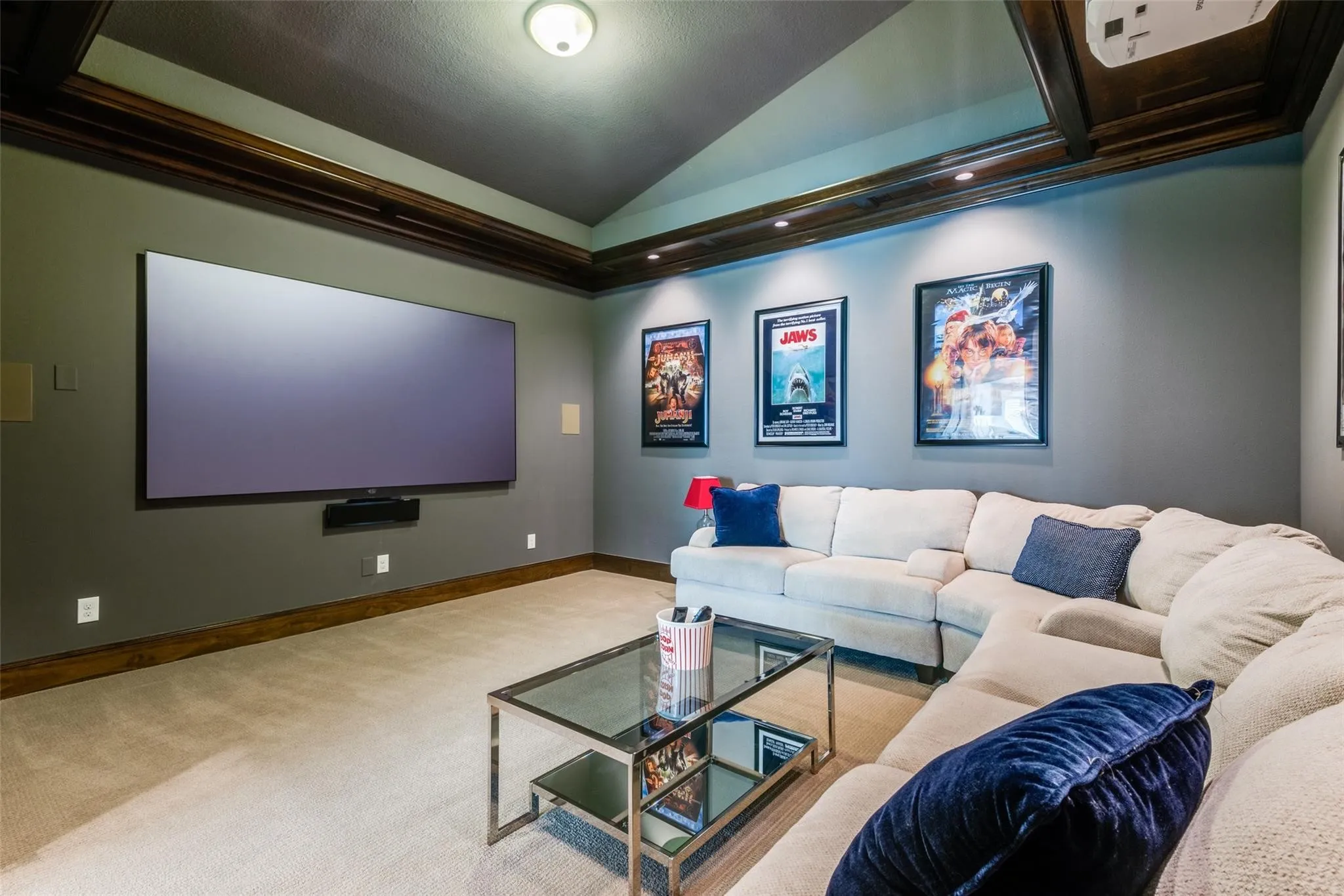 Movie nights will never be the same in this impressive media room, designed to bring the cinematic experience home. Spacious enough to accommodate large sectional seating and multiple viewing arrangements, this dedicated entertainment space is the perfect setting for family movie nights, game-day gatherings, or binge-watching your favorite series.