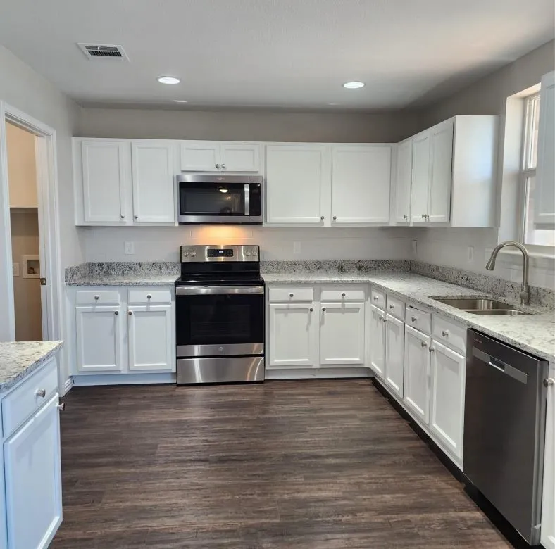 beautiful kitchen with granite countertops