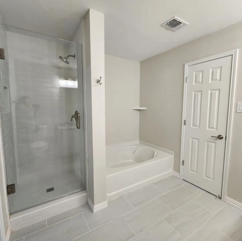 separate shower and tub in the primary suite