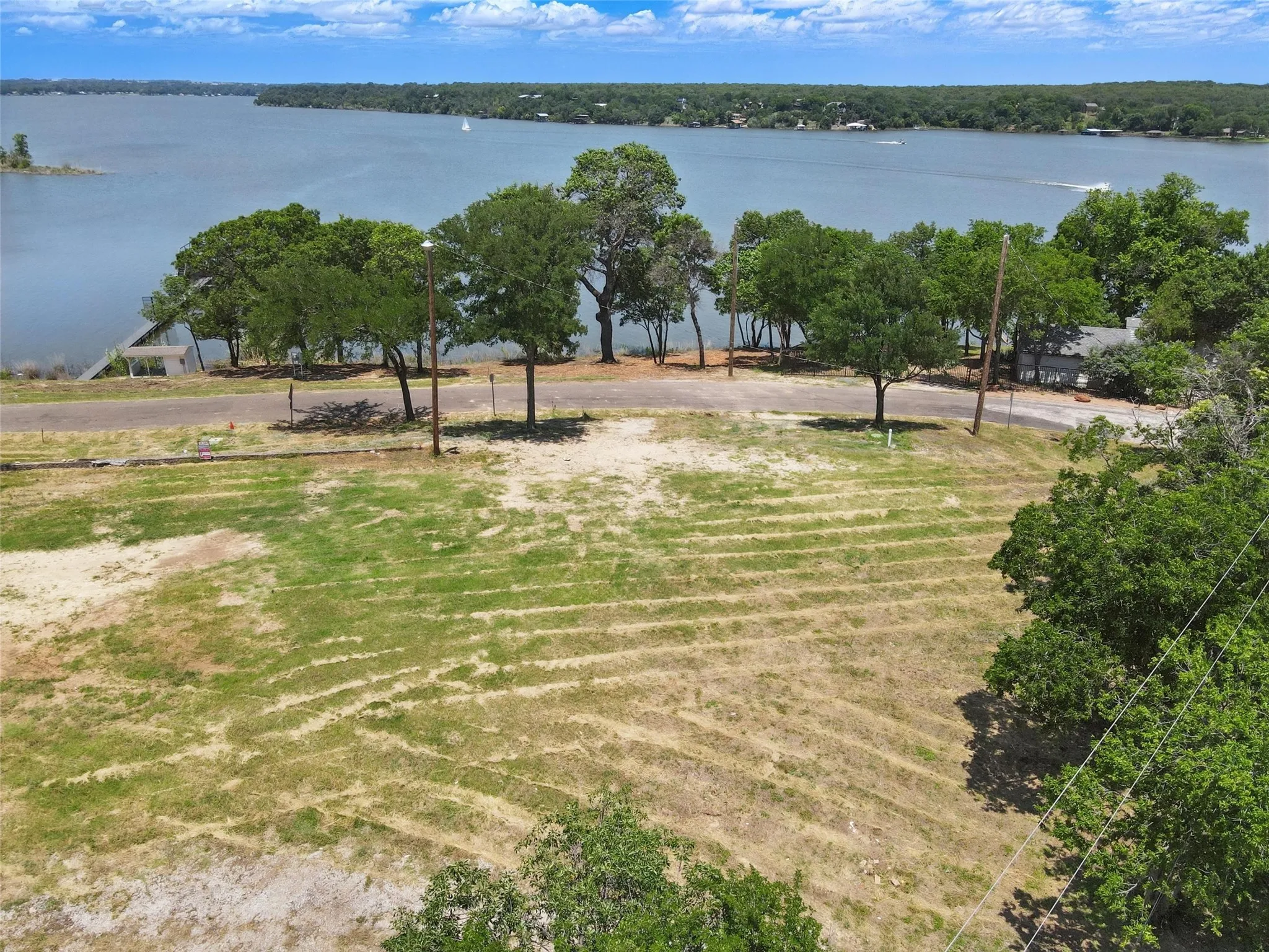 Aerial view of a nearby body of​​‌​​​​‌​​‌‌​‌‌​​​‌‌​‌​‌​‌​​​‌​​ water