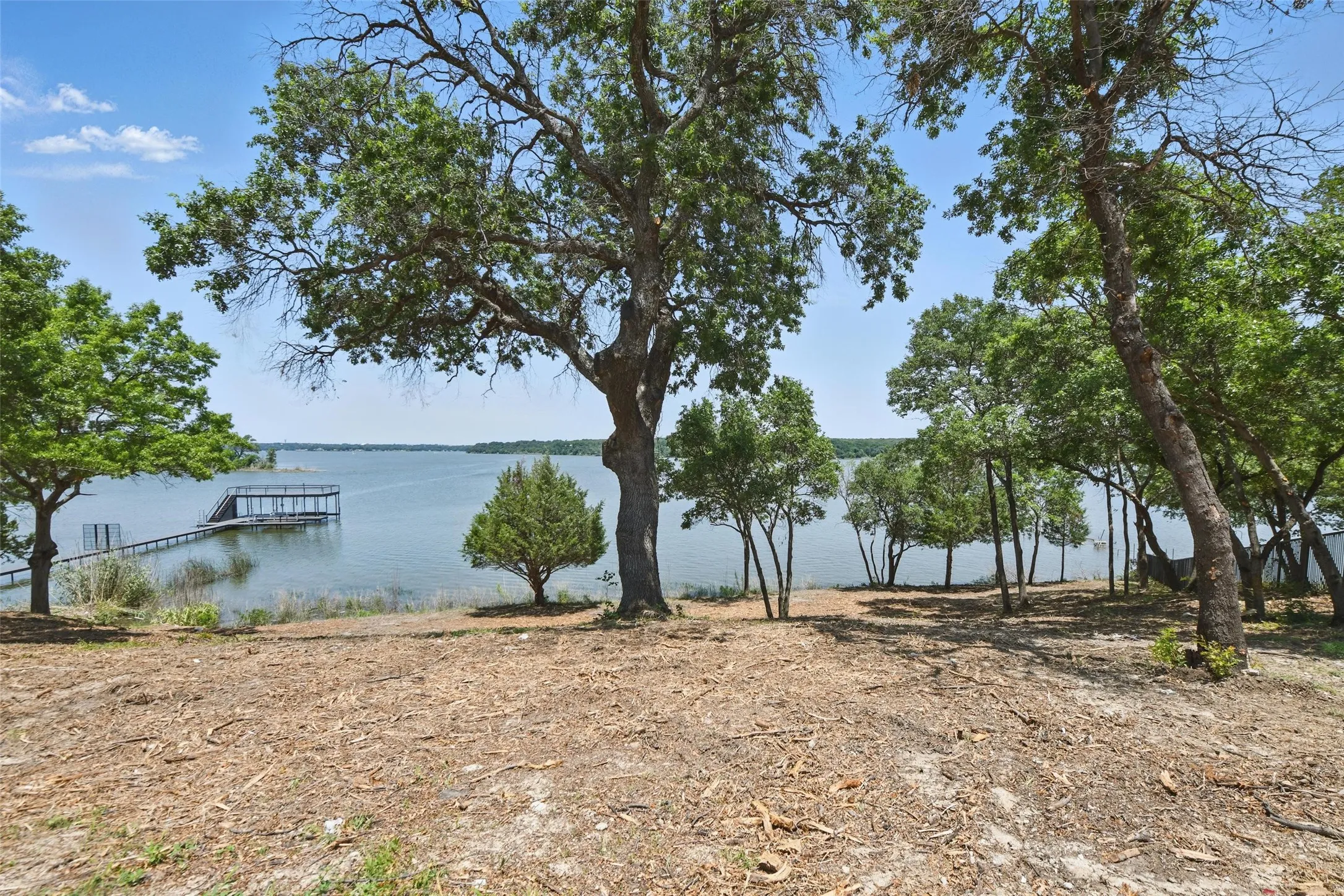 Water view with a dock