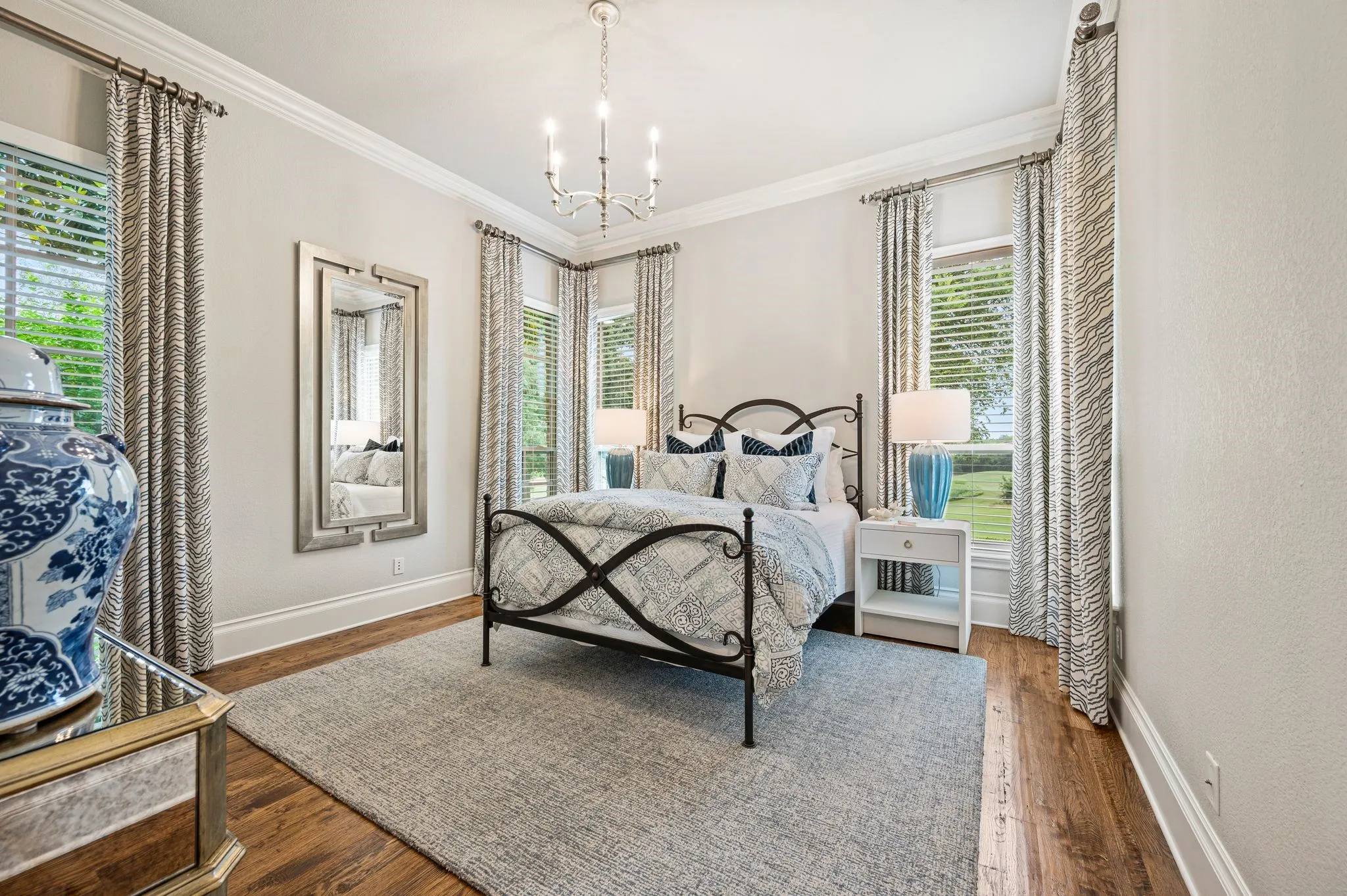 The private guest bedroom is located on the main level & has beautiful golf course views, too!