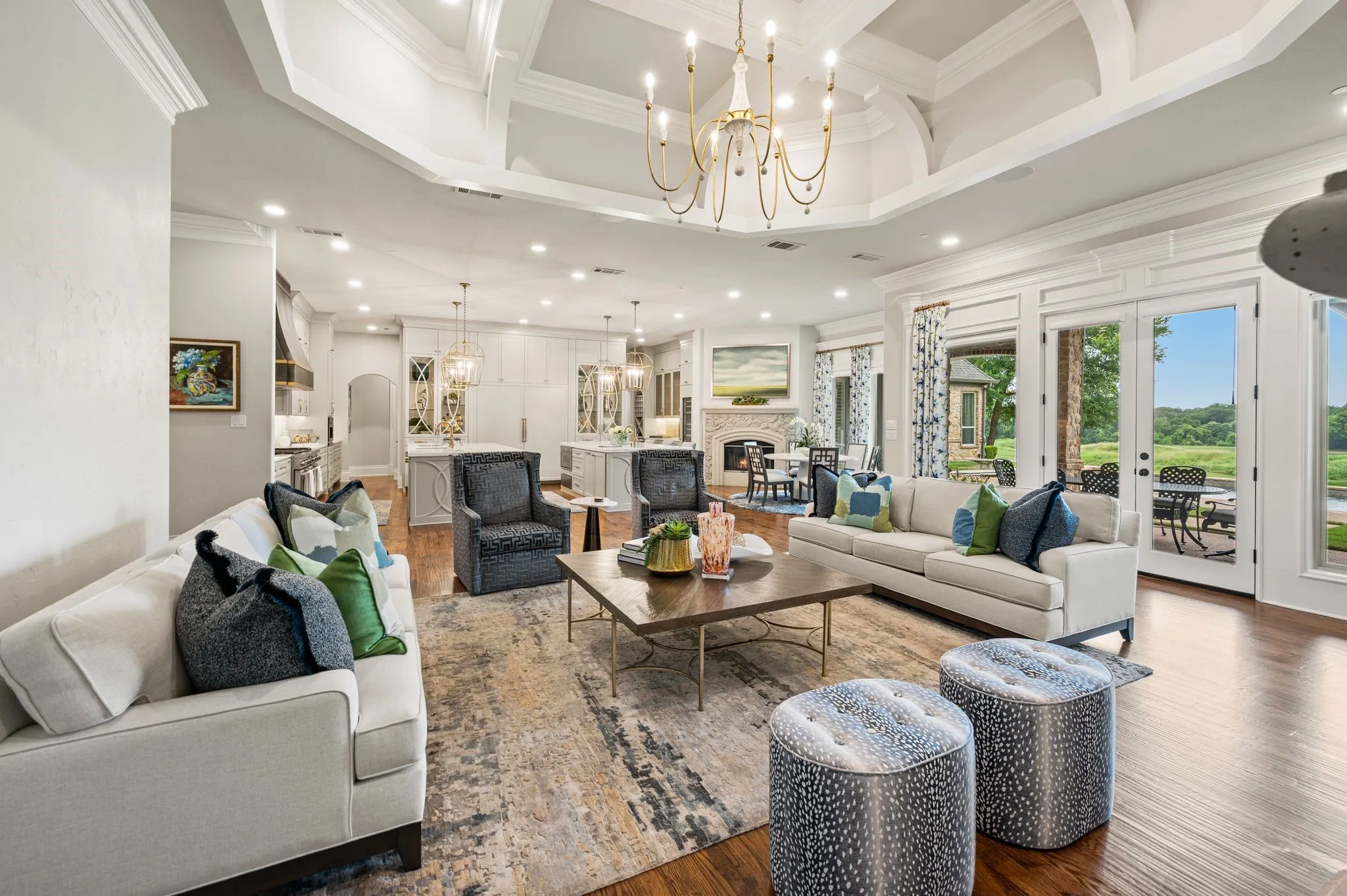Alternate view of the family room revealing the wall of windows overlooking the patio, pool & golf course!