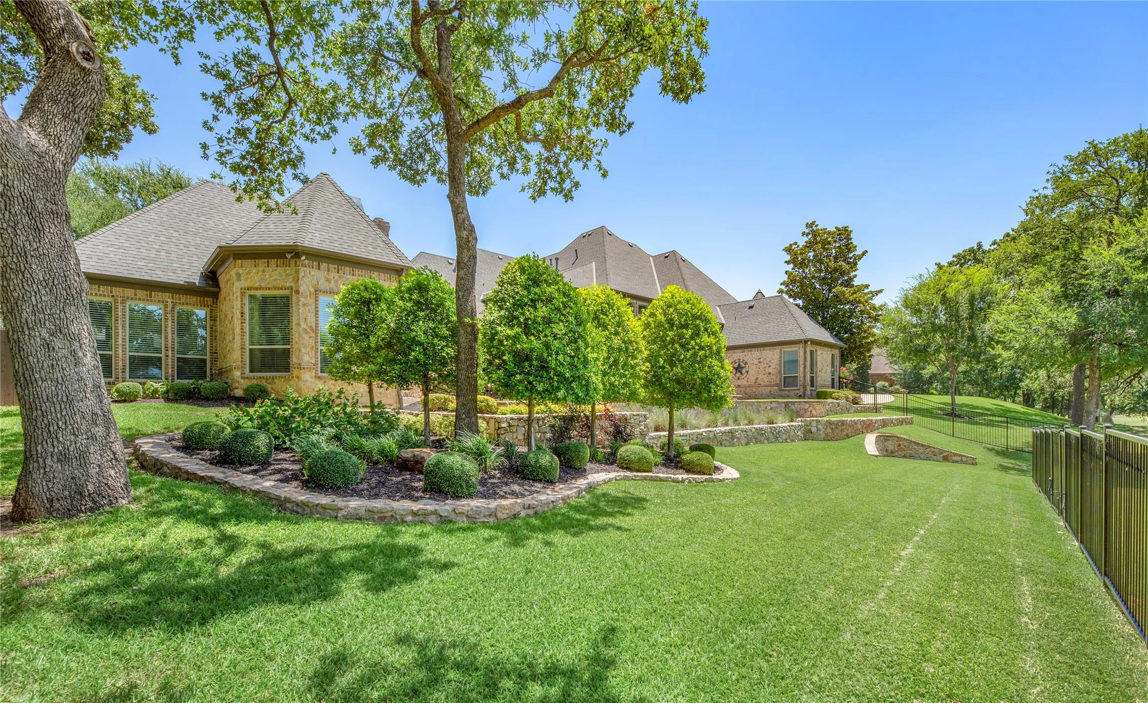 View along the south side of the property overlooking the fairway of the Timarron golf course.