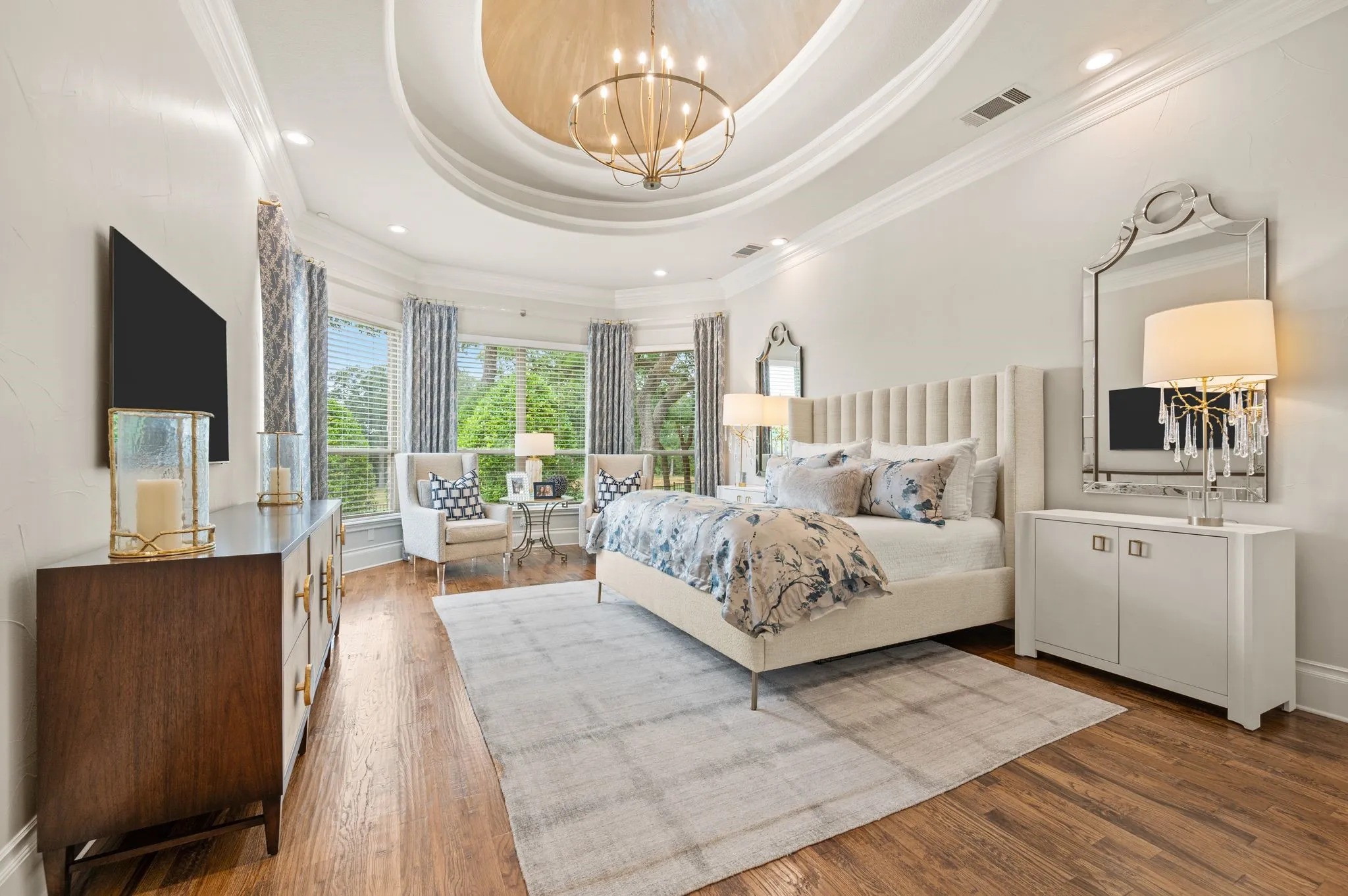 Primary bedroom suite is perfectly placed to capture golf views from the sitting area. Lovely updates abound!