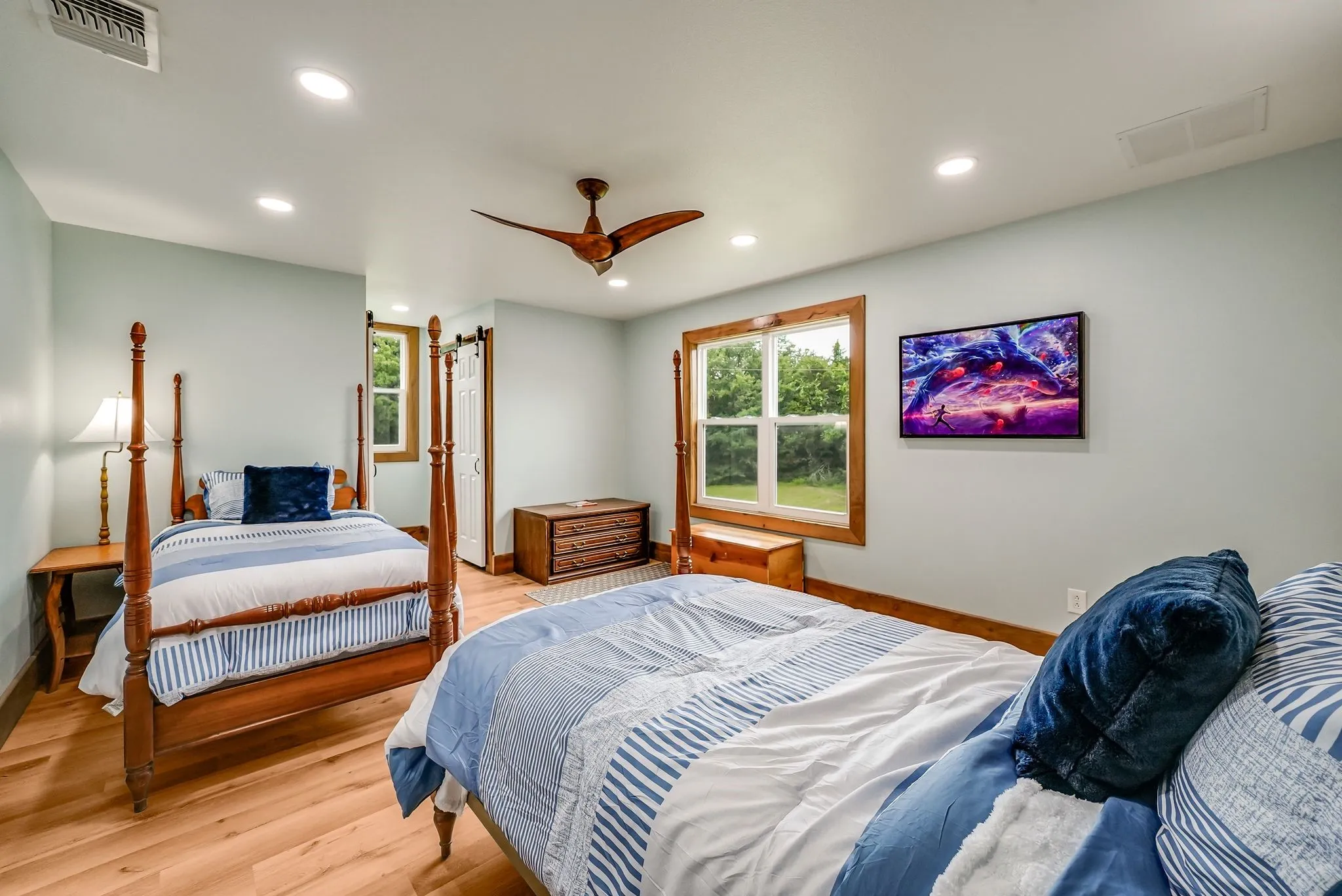 Bedroom #3 on second floor w/ connecting ensuite full bathroom featuring wood-finish flooring, recessed lighting, and a ceiling fan
