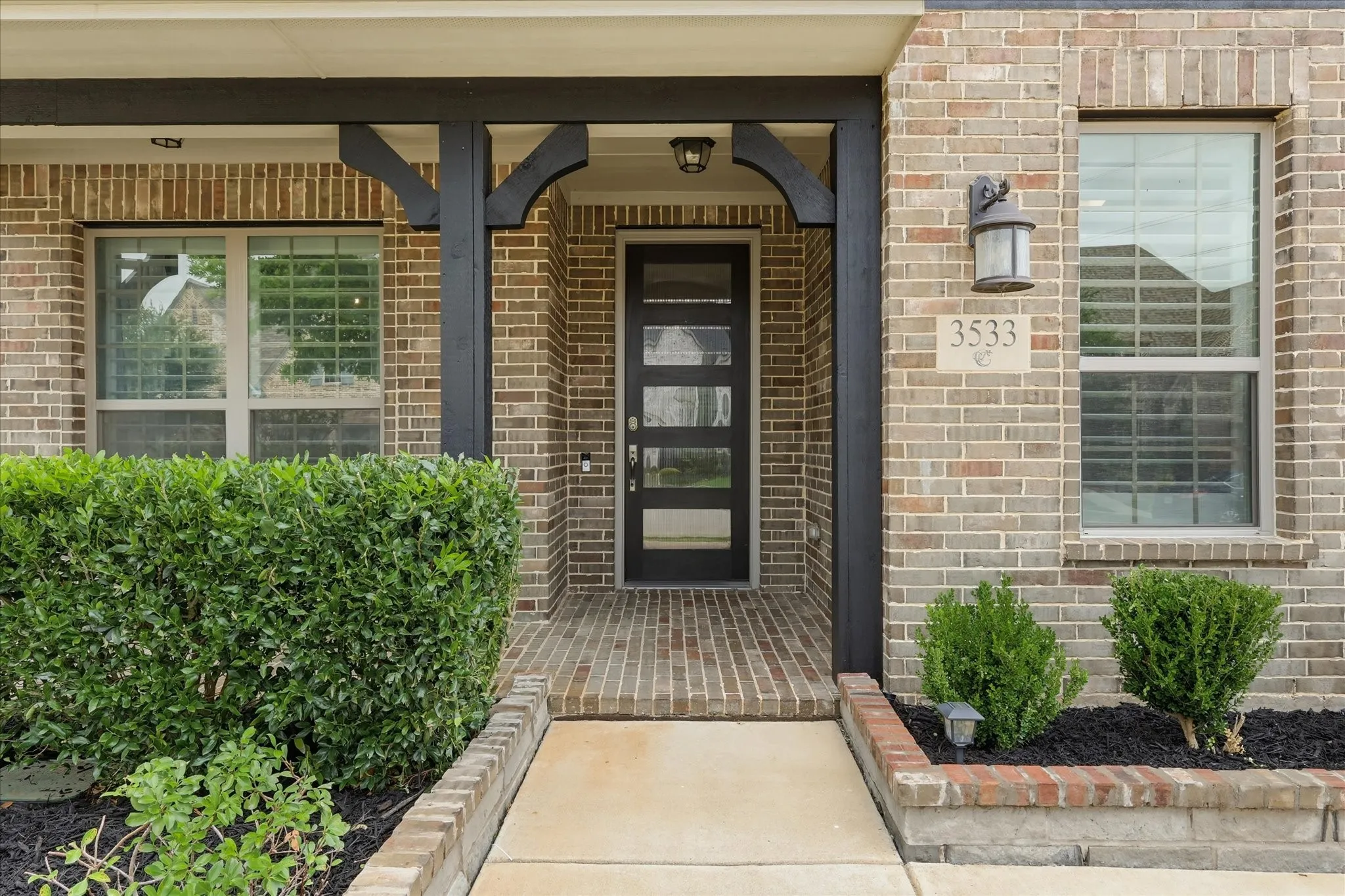 Inviting porch with glass accent door
