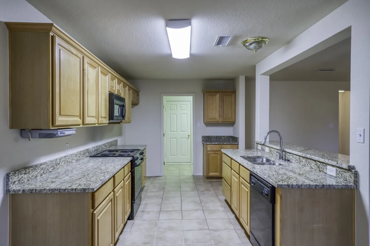 Kitchen to walk in pantry and laundry room