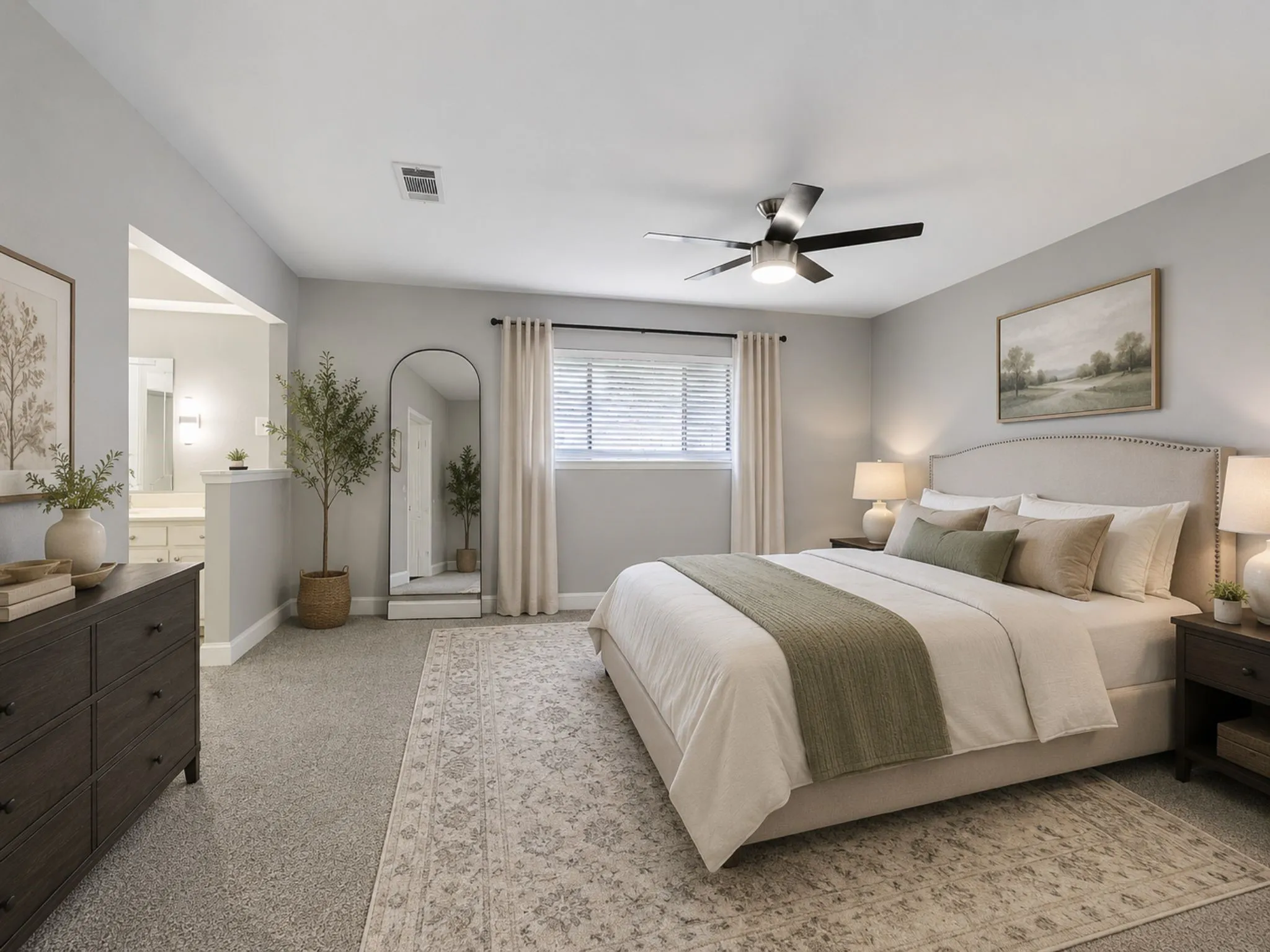 Relax and unwind in the spacious primary suite featuring room for oversized furnishings and direct access to the ensuite bath.