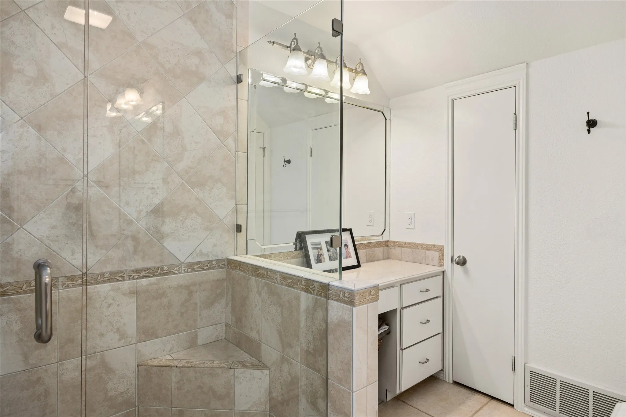 Tiled Shower in Bathroom on Main Level