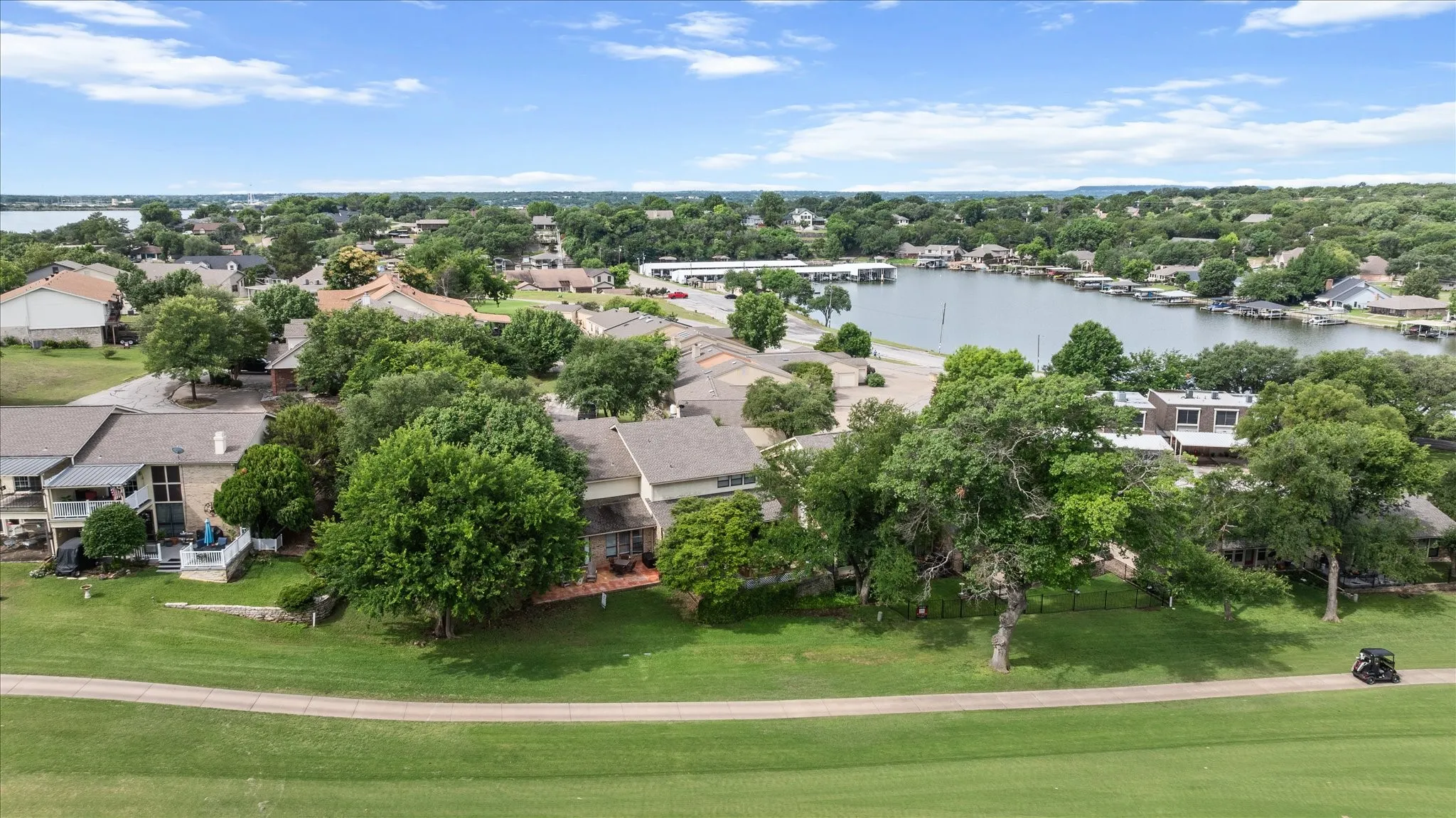 Aerial perspective showcasing the back patio and Golf Course
