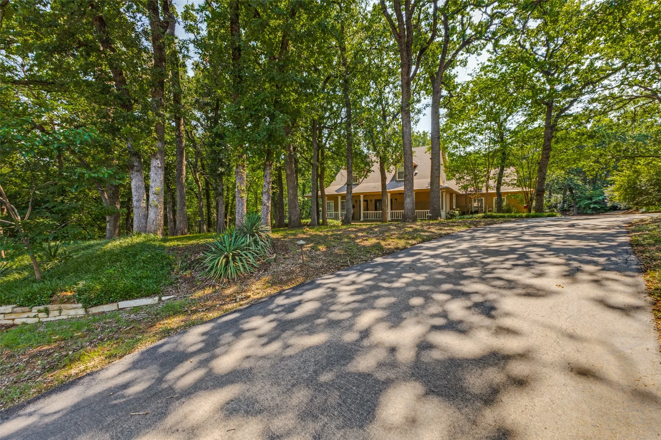 Incredible drive up leads up to your 5 car garages!