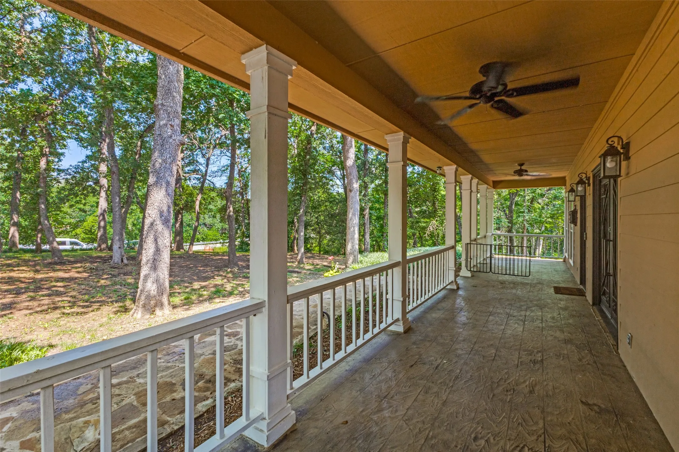 Fantastic front porch with two ceiling fans!