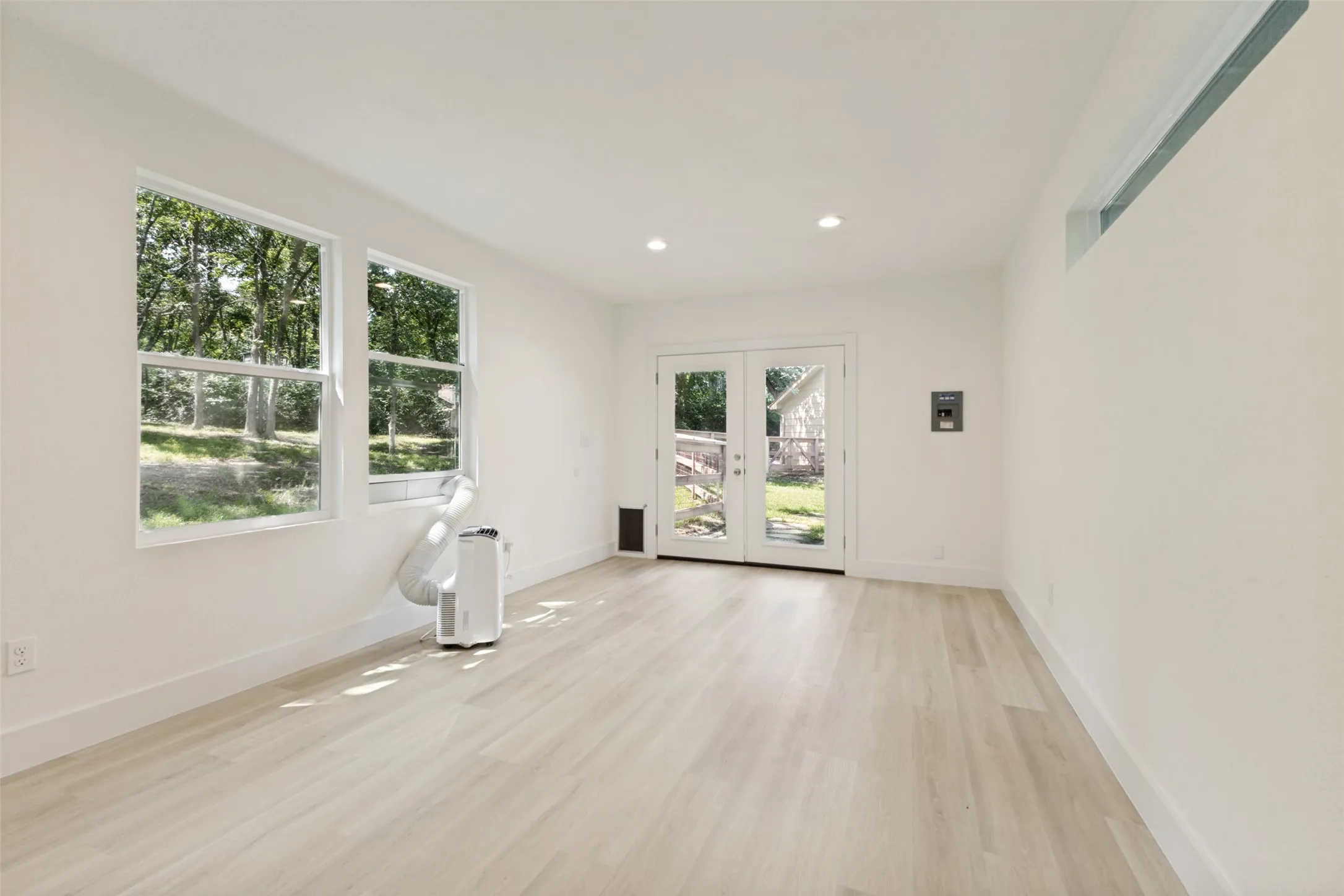 Recently renovated outbuilding is the perfect Office, Art Studio, Workout Room, or whatever you need!