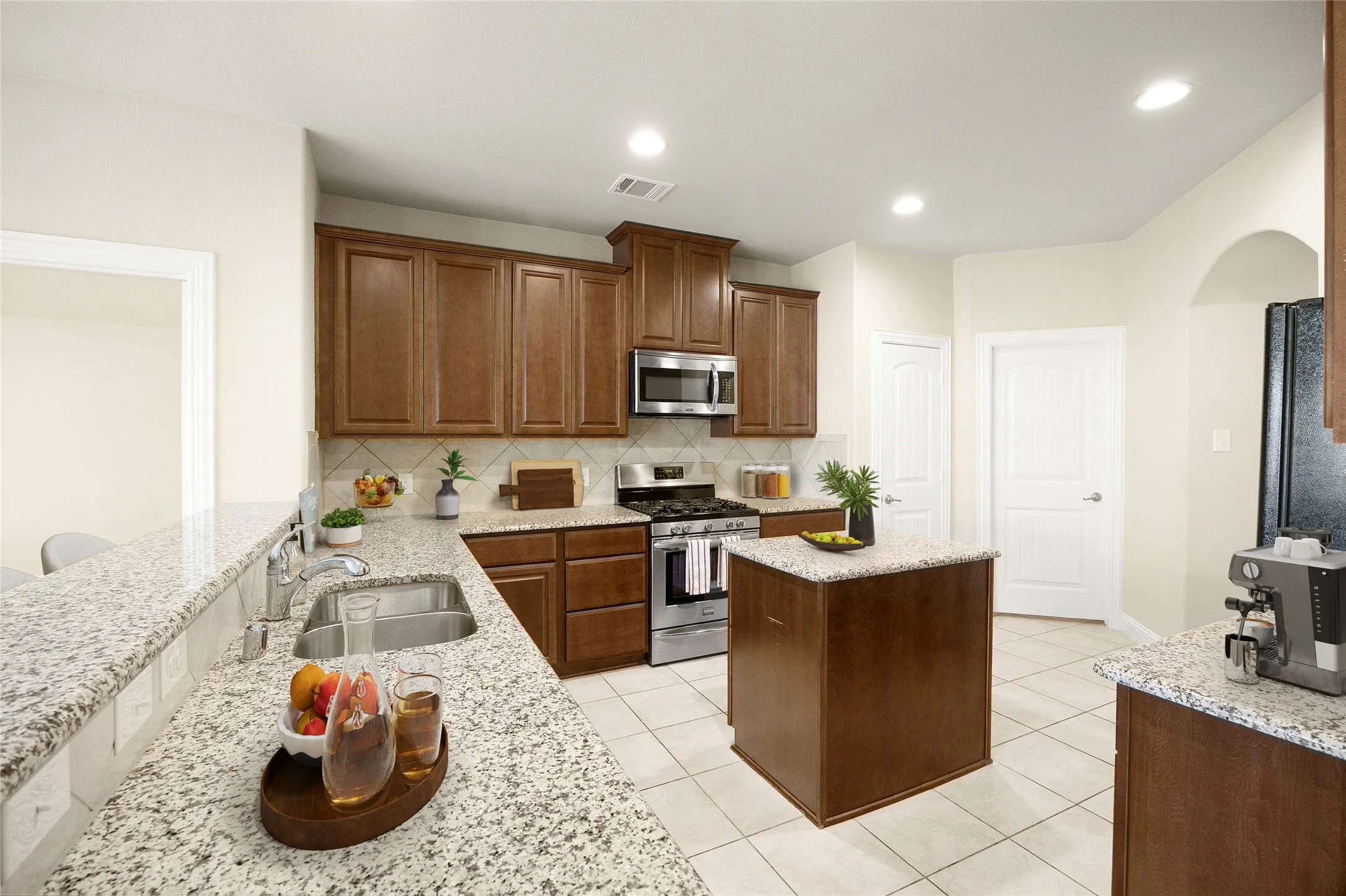 Lots of counter space, island and tons of cabinets.