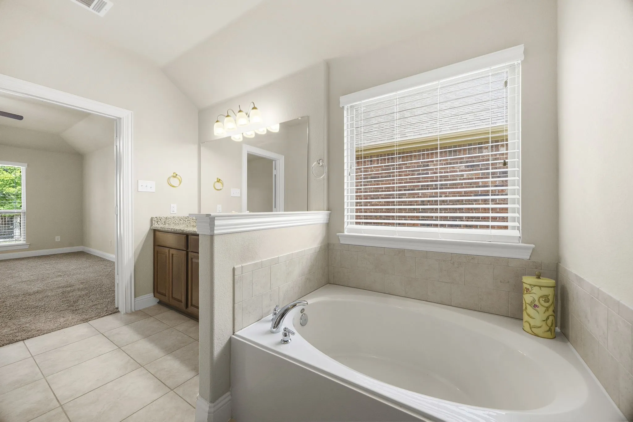 Primary bath has a separate bath tub and shower.
