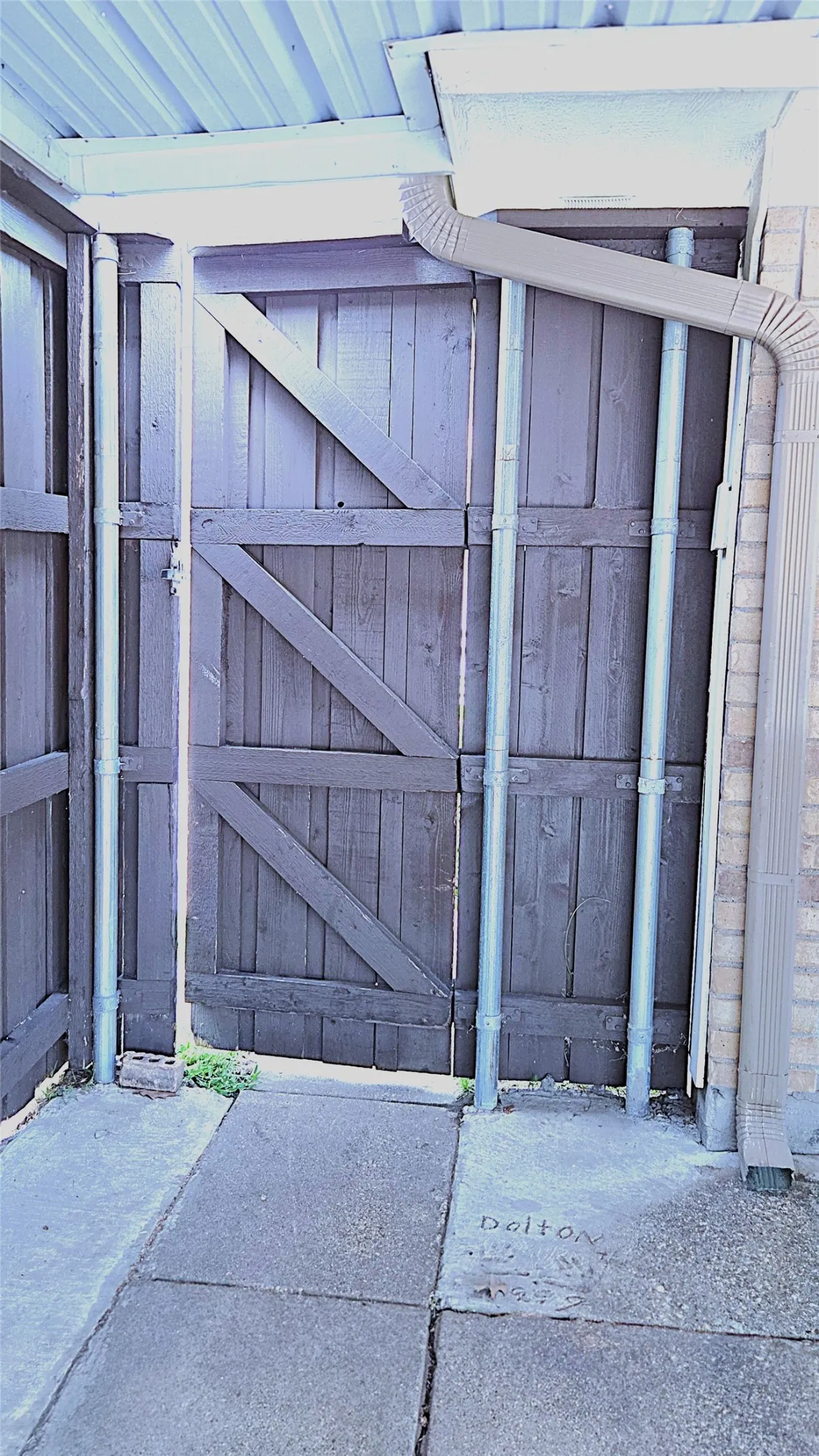Backyard gate from carport.